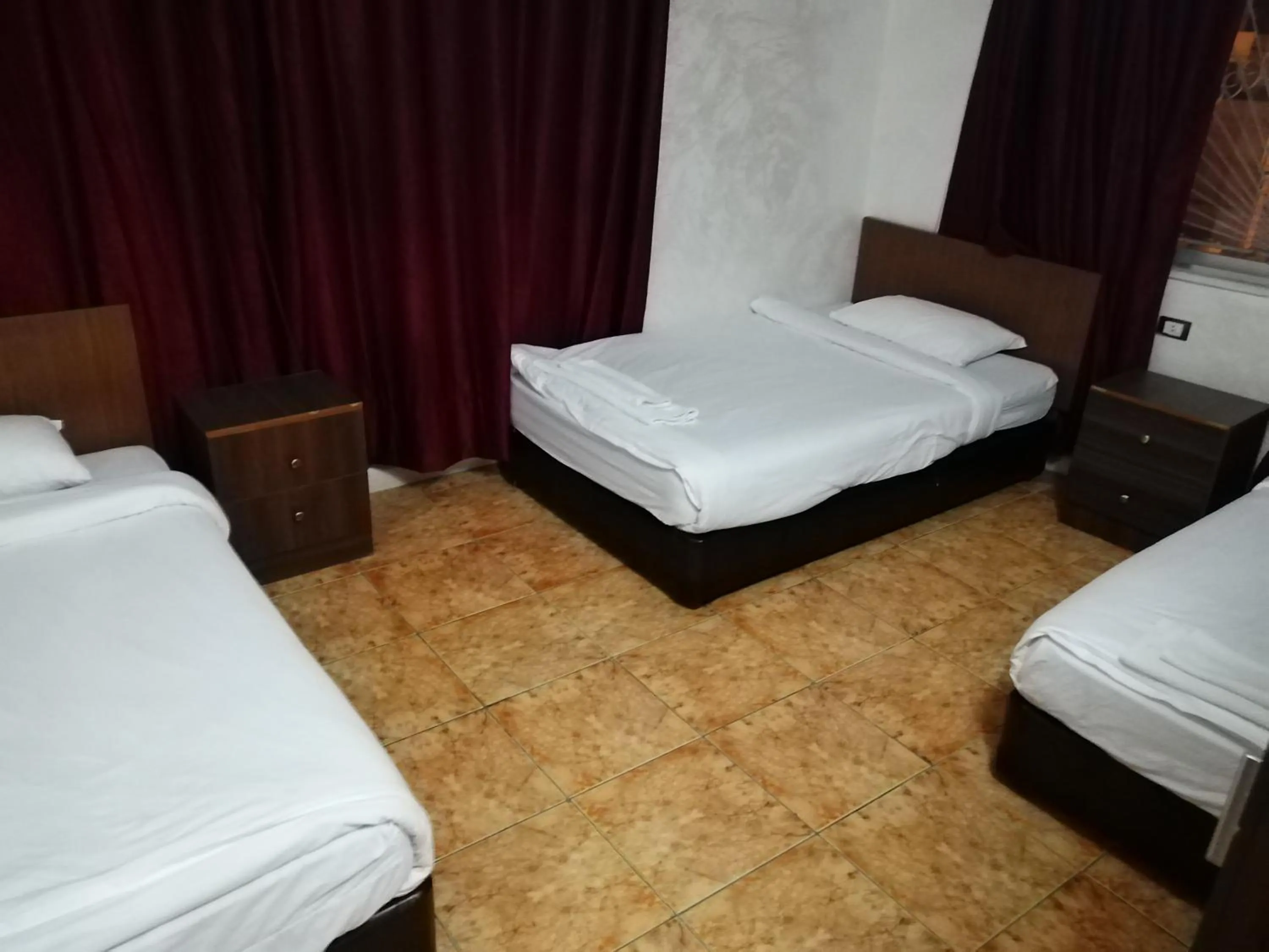 Bed in Al-Houriat Hotel