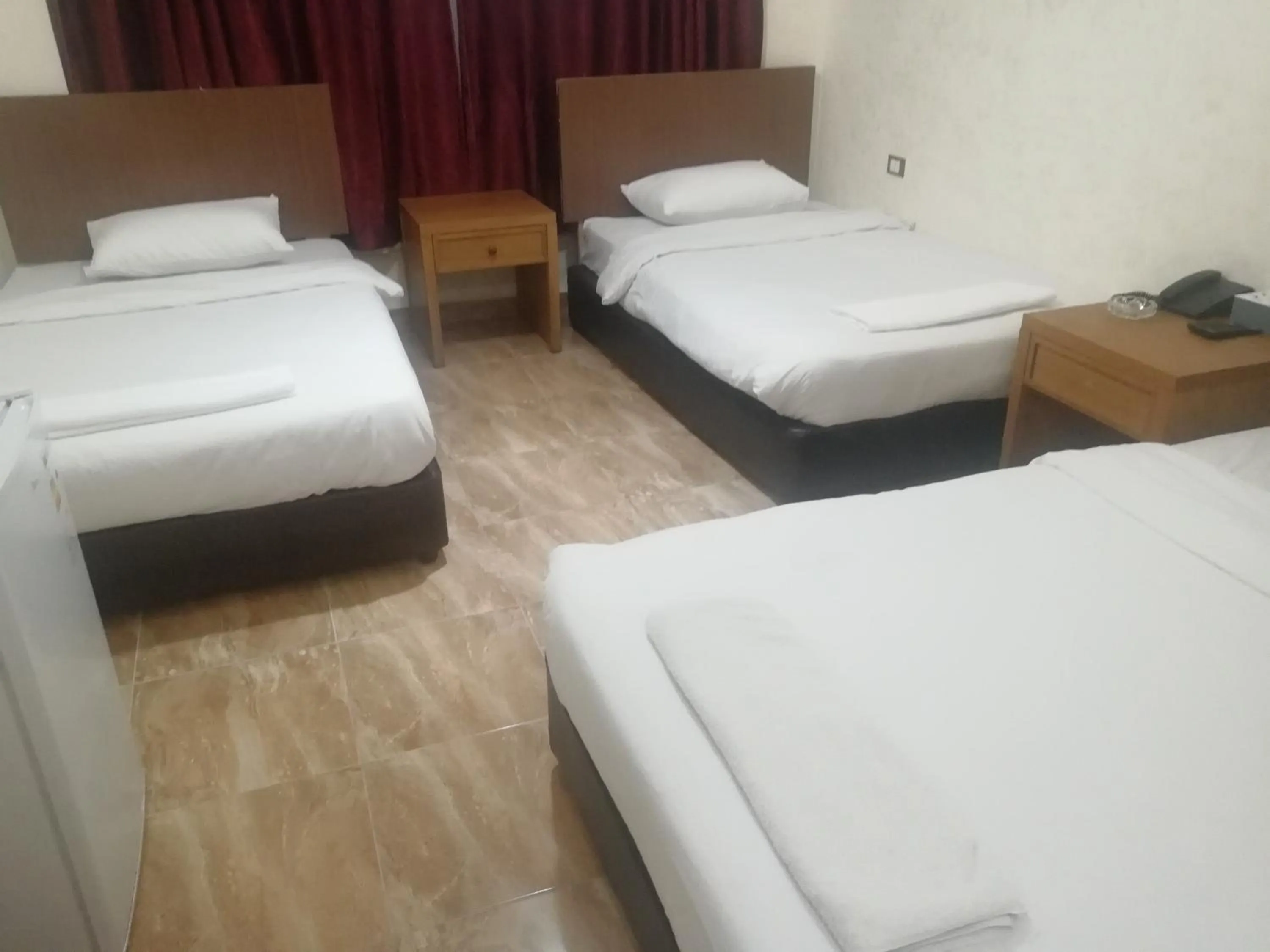 Bed in Al-Houriat Hotel