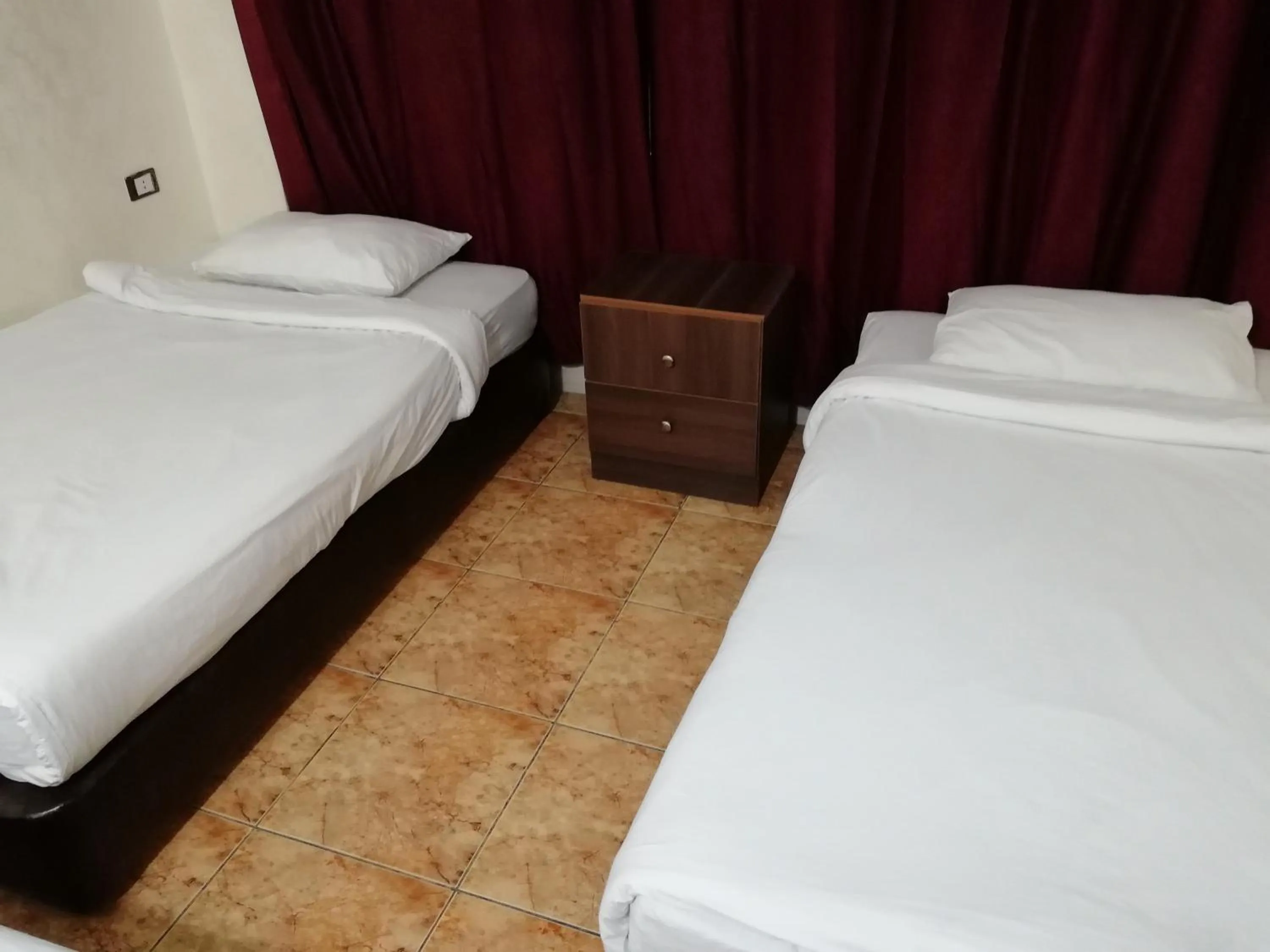 Bed in Al-Houriat Hotel