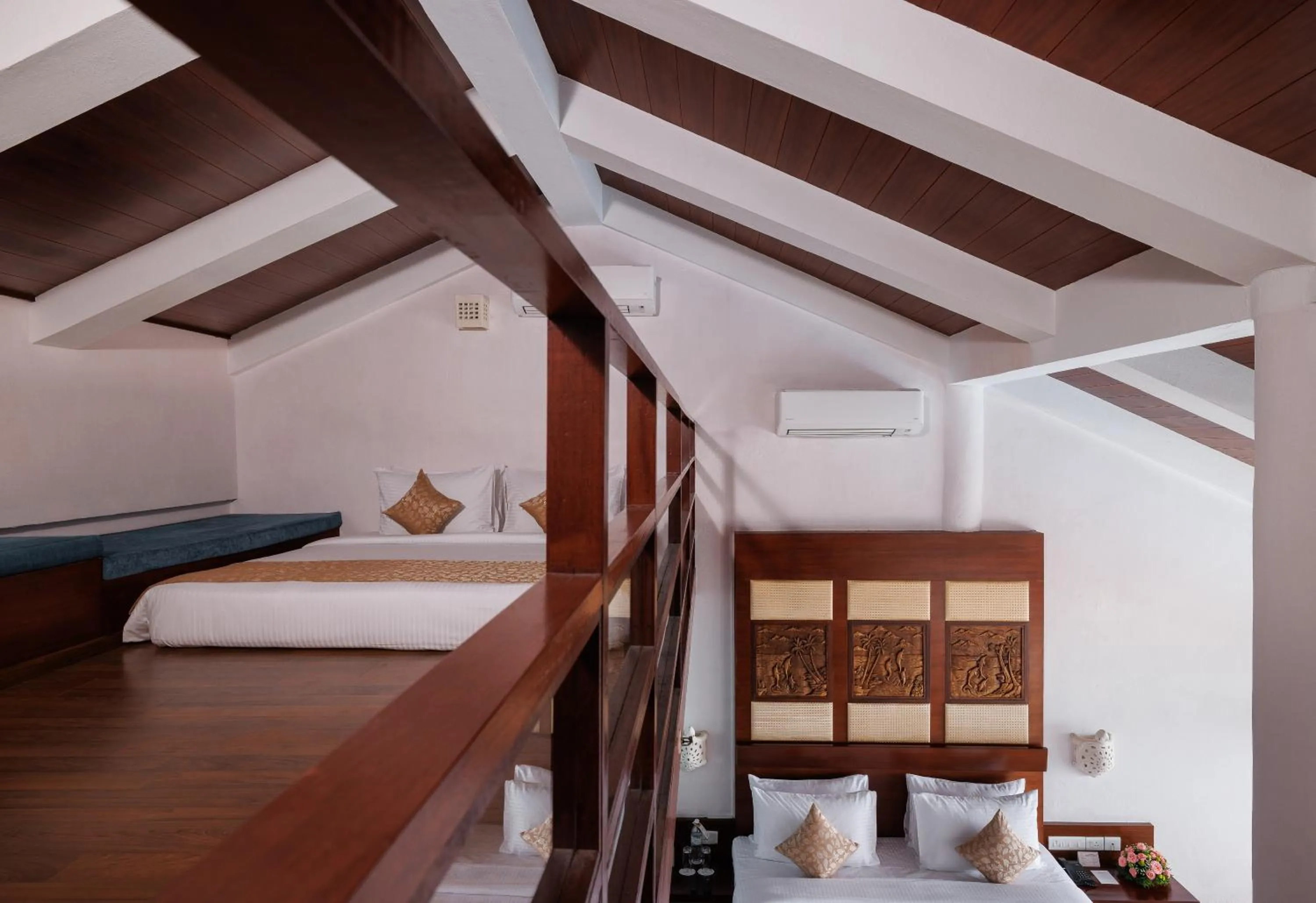 Bed in Gokulam Grand Turtle On The Beach