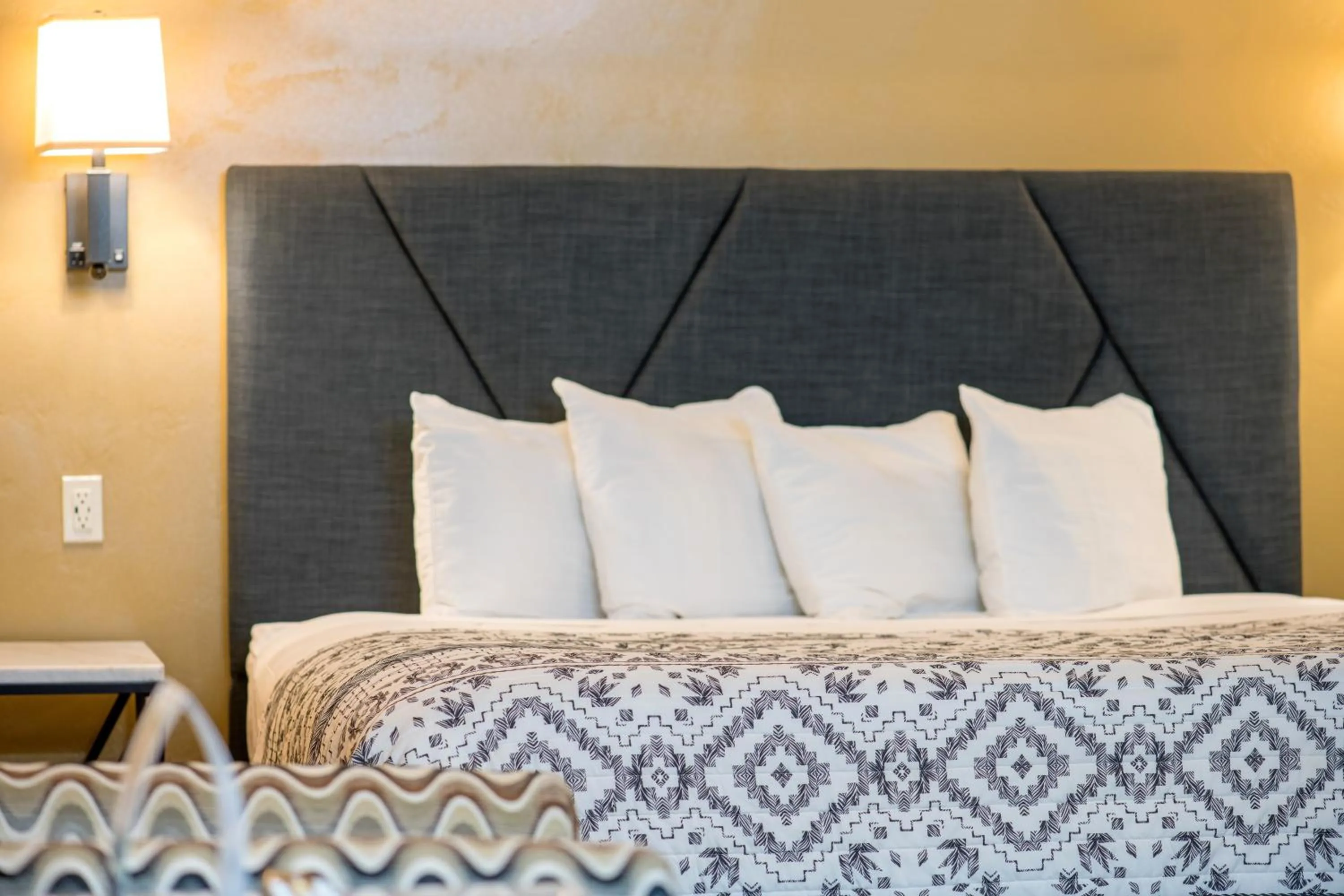 Bed in Glenwood Springs Cedar Lodge