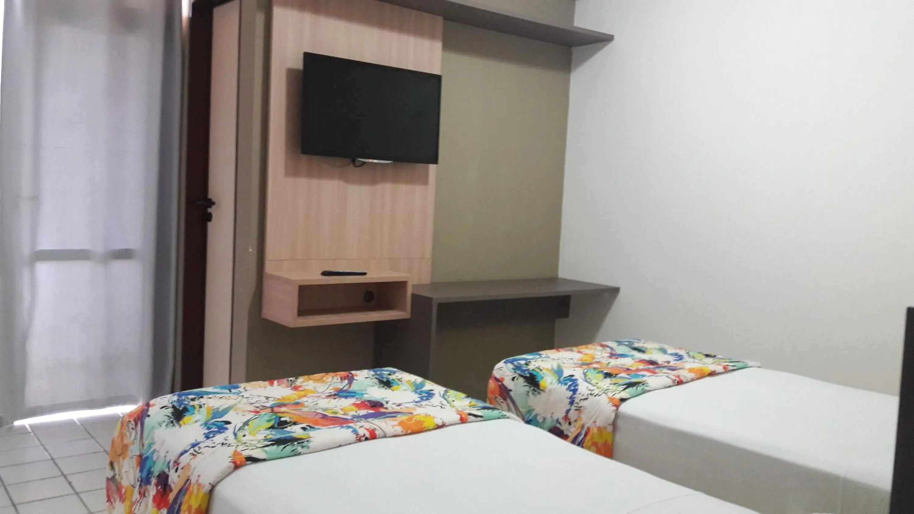 Bed in Xênius Hotel