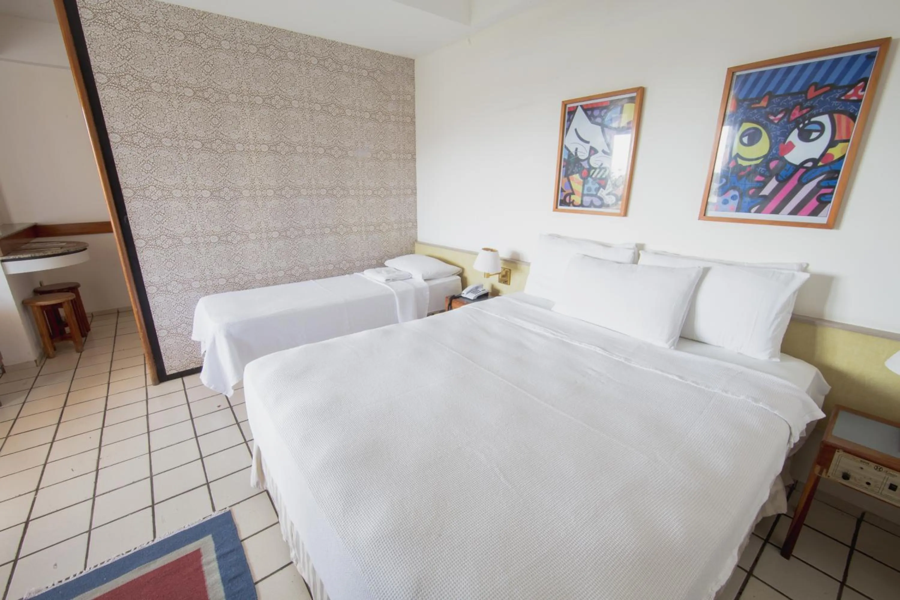 Bed in Xênius Hotel