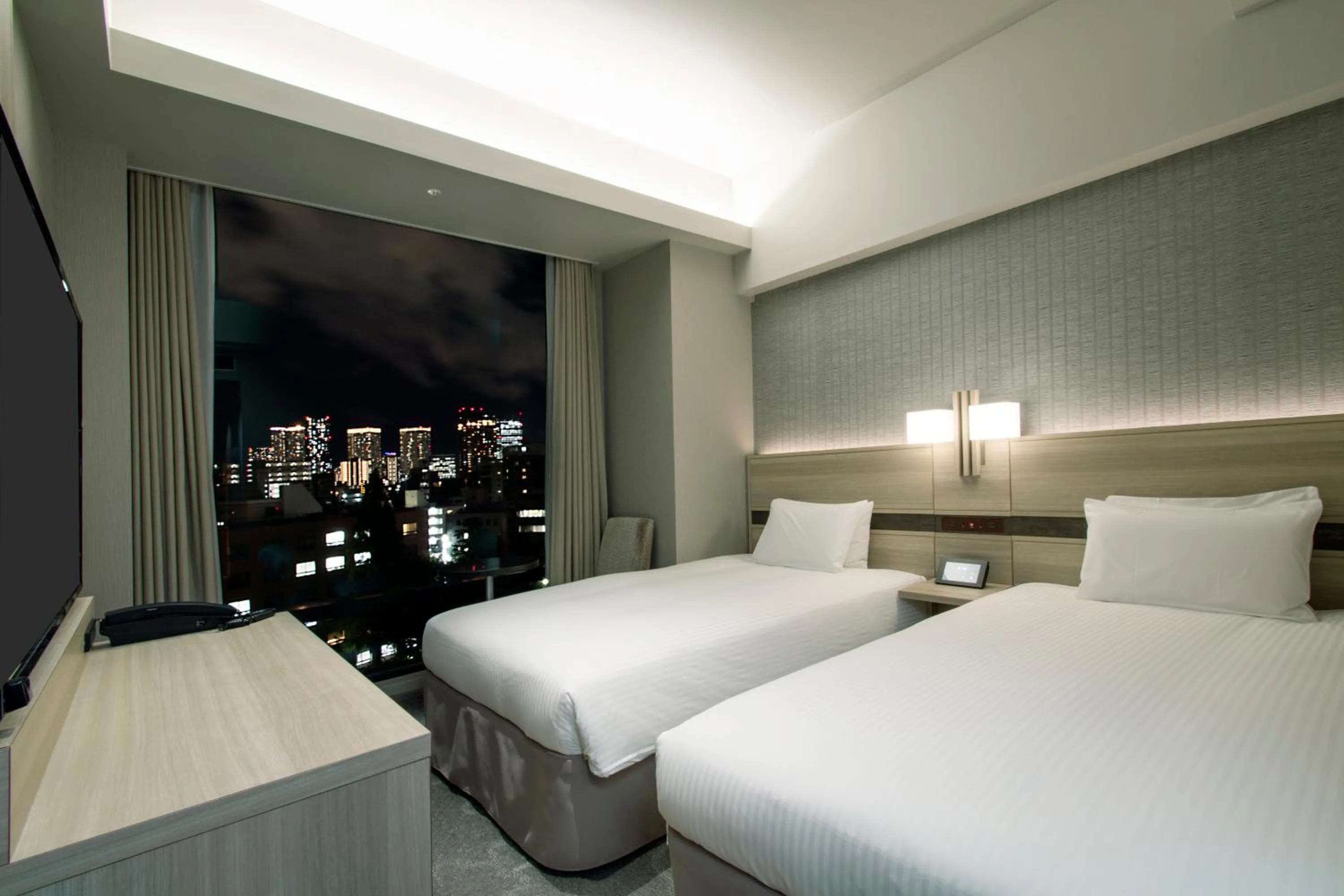 Bed in Hotel Keihan Tsukiji Ginza Grande