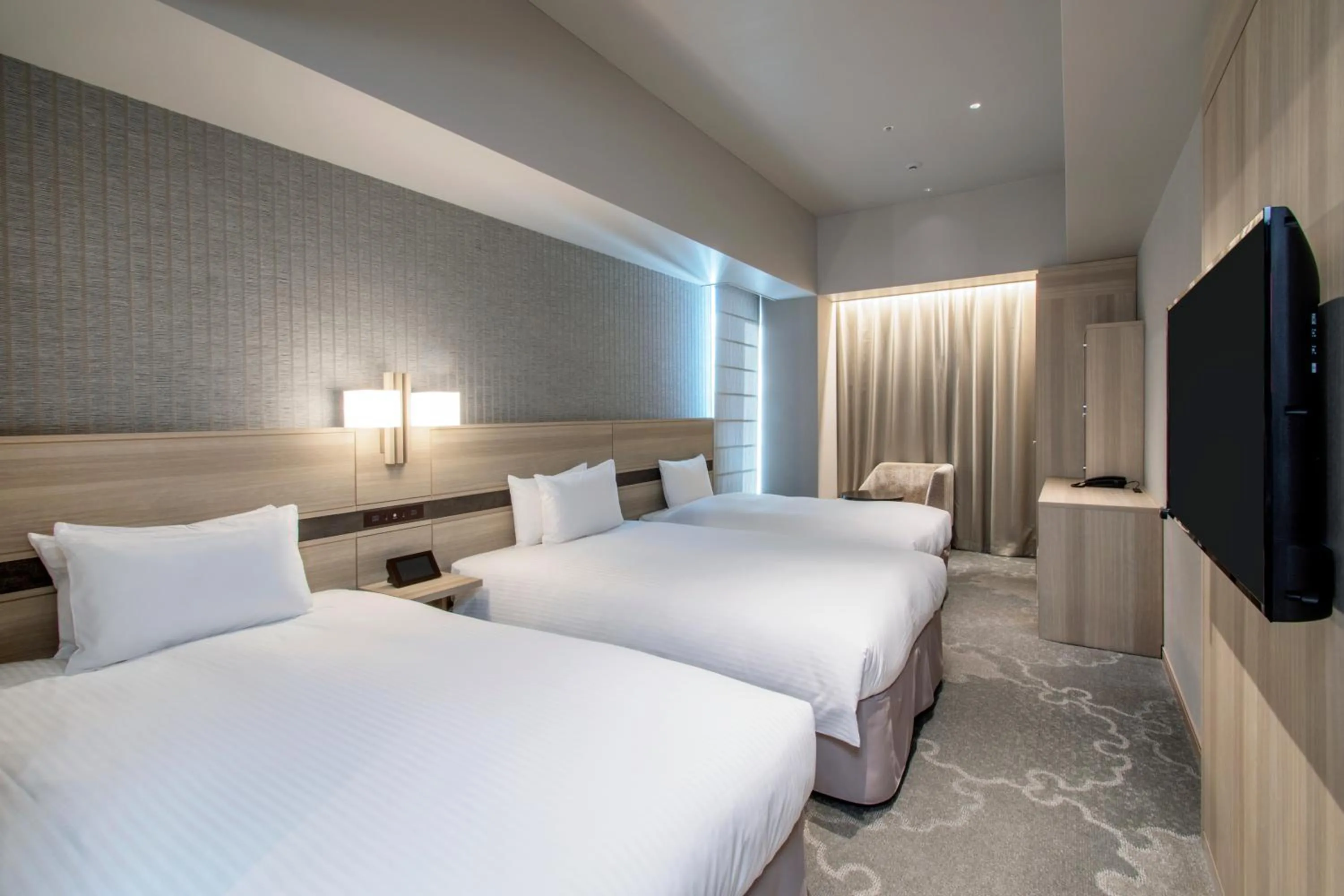 Bed in Hotel Keihan Tsukiji Ginza Grande