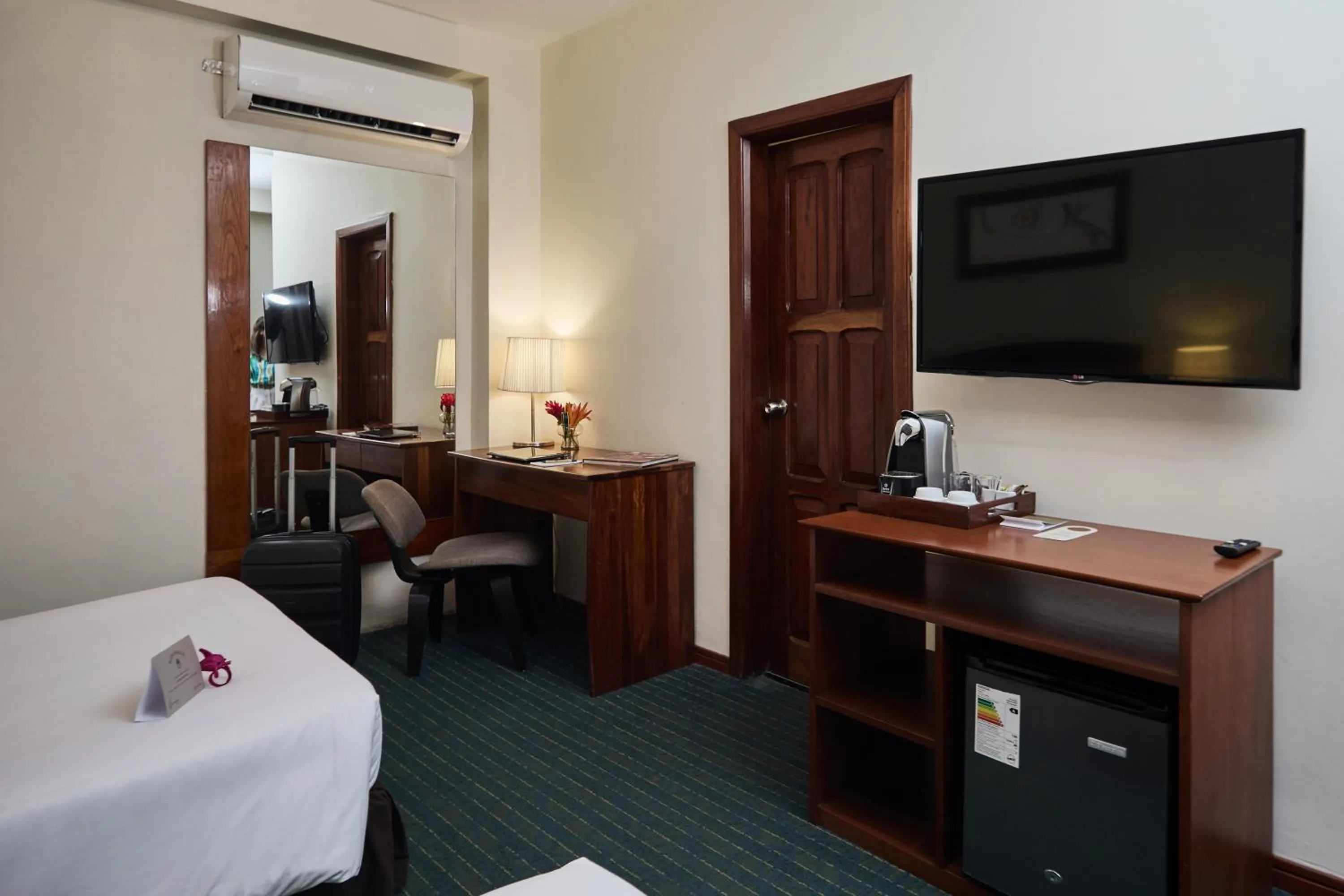 Bed in El Dorado Classic Hotel