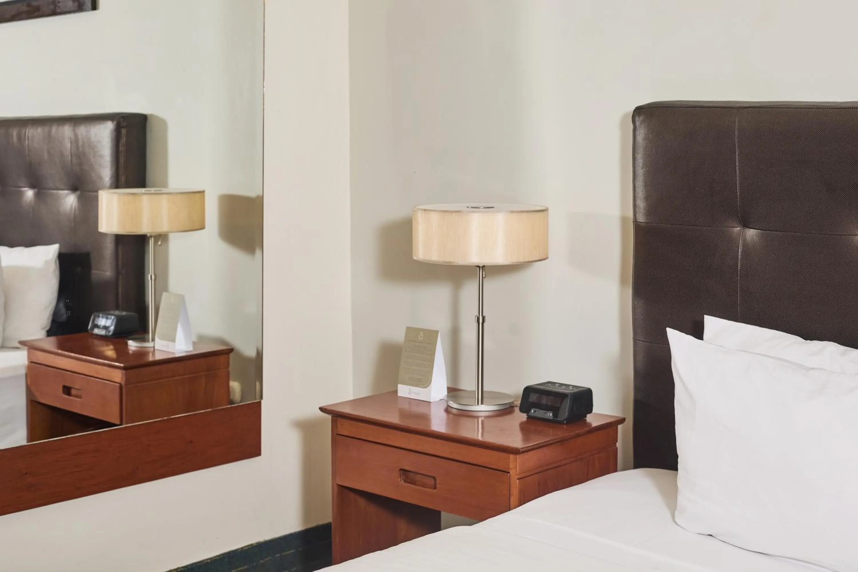 Bed in El Dorado Classic Hotel