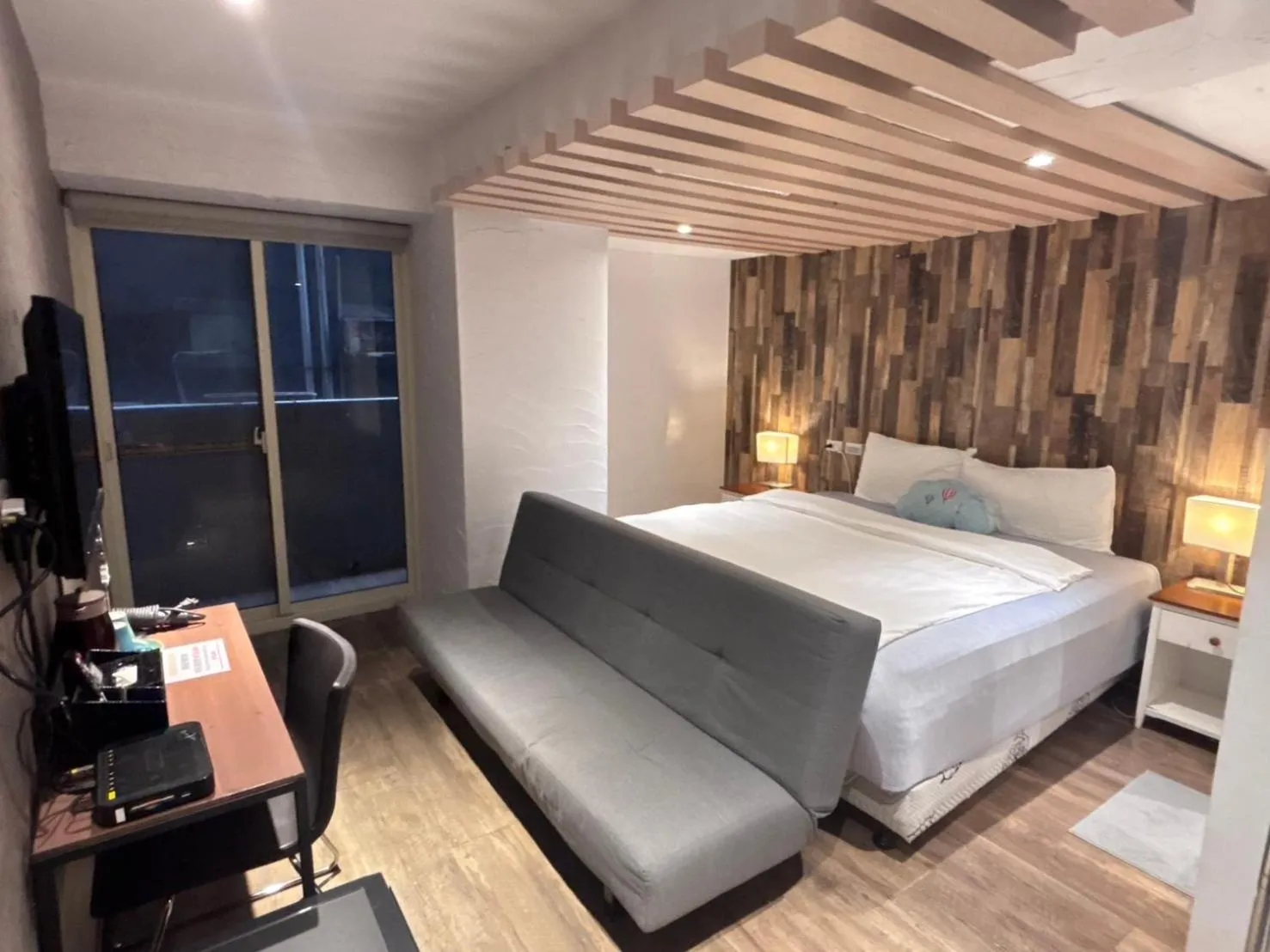 Bed in M Taipei Hotel