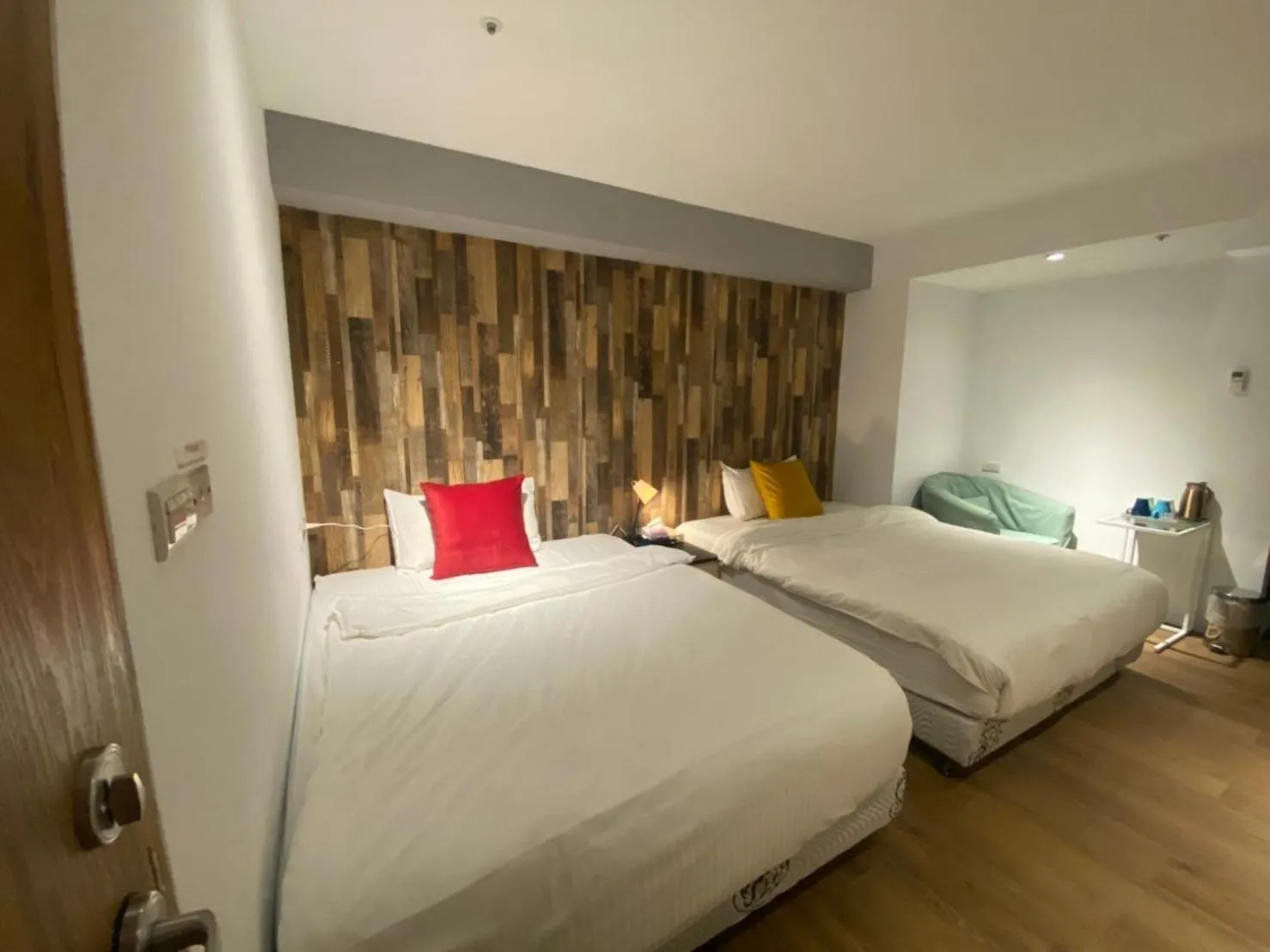 Bed in M Taipei Hotel