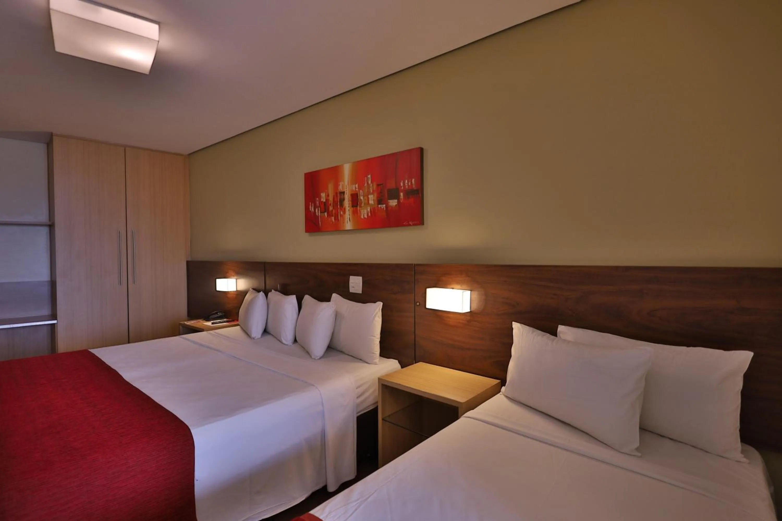 Bed in Ramada Hotel & Suites Lagoa Santa By Wyndham