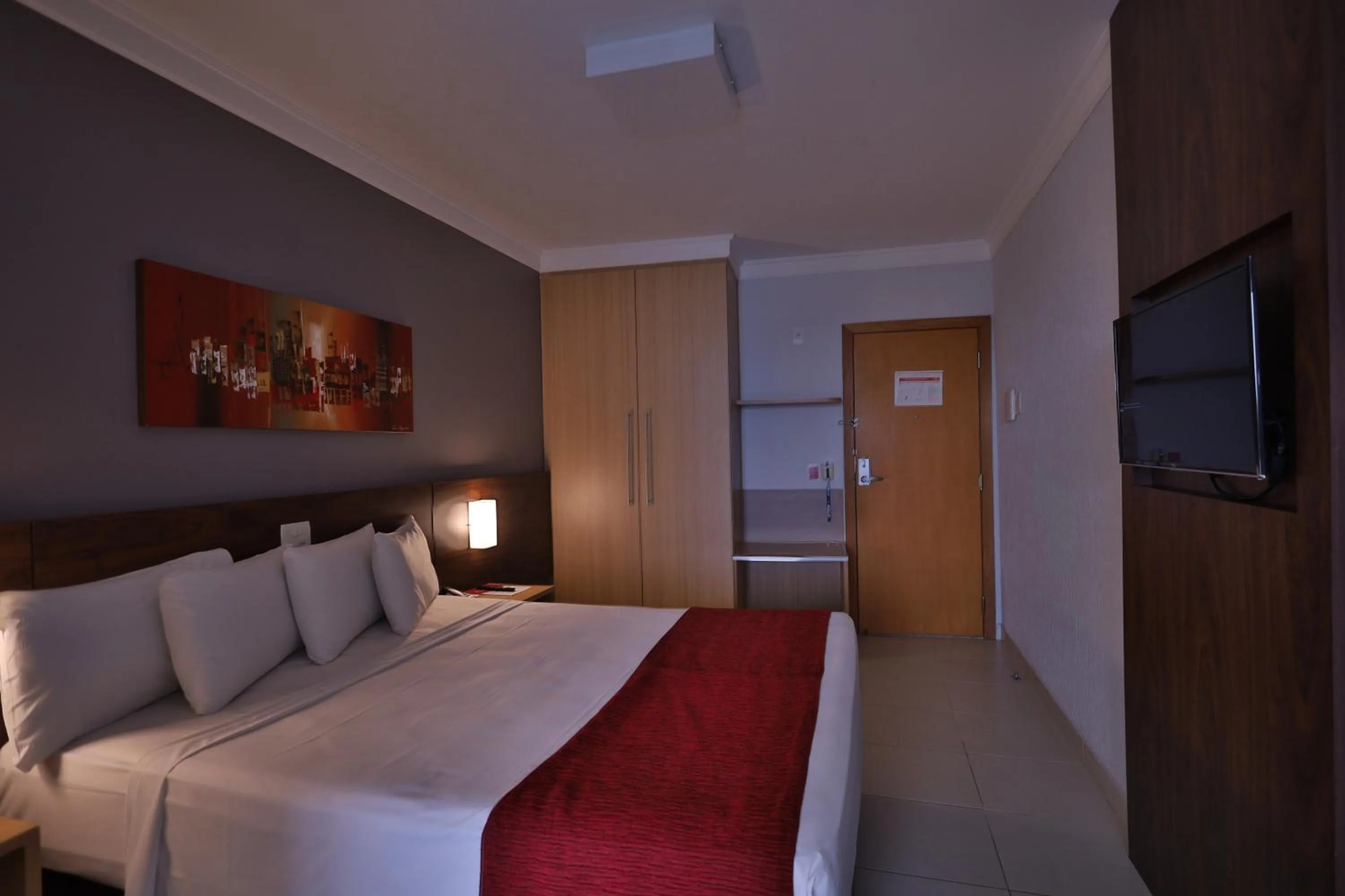 Bed in Ramada Hotel & Suites Lagoa Santa By Wyndham
