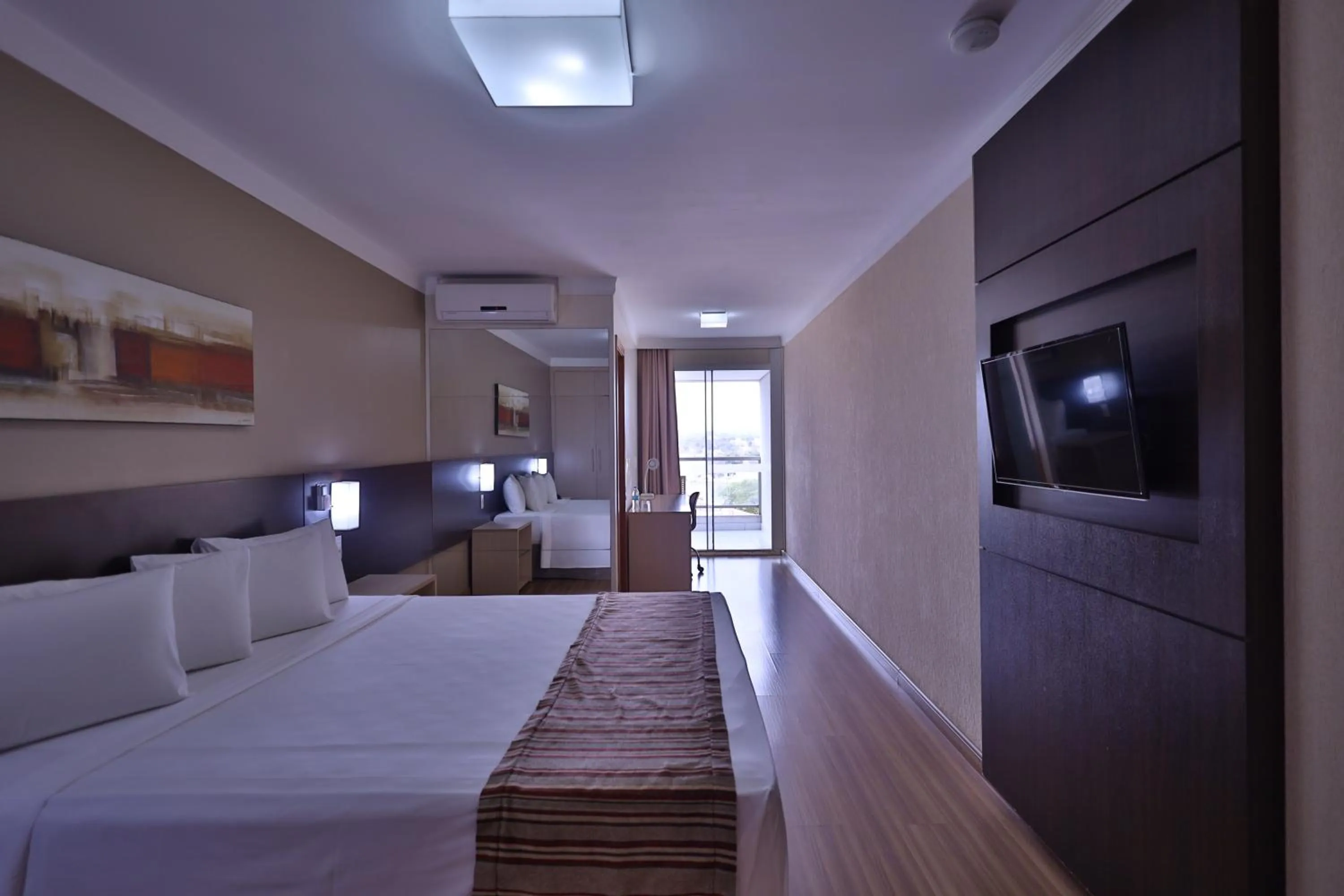 Bed in Ramada Hotel & Suites Lagoa Santa By Wyndham