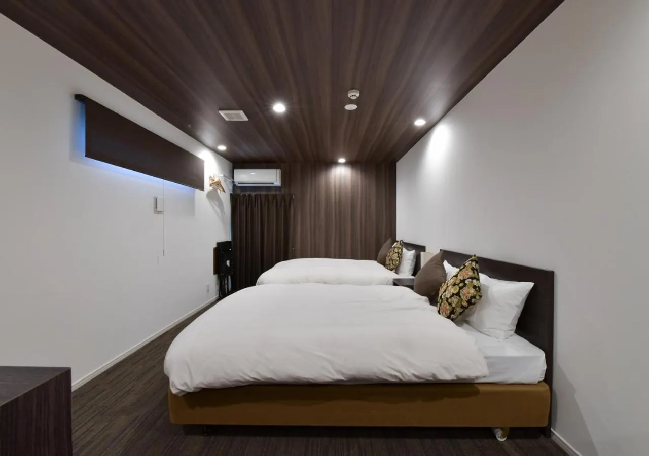 Bed in Villa Front Kyoto Seimei