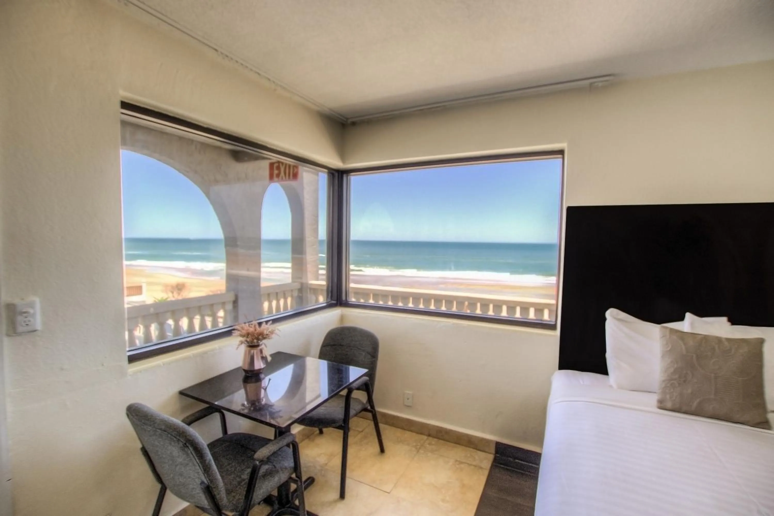 View (from property/room), Bed in La Bella Oceanfront Inn - Daytona