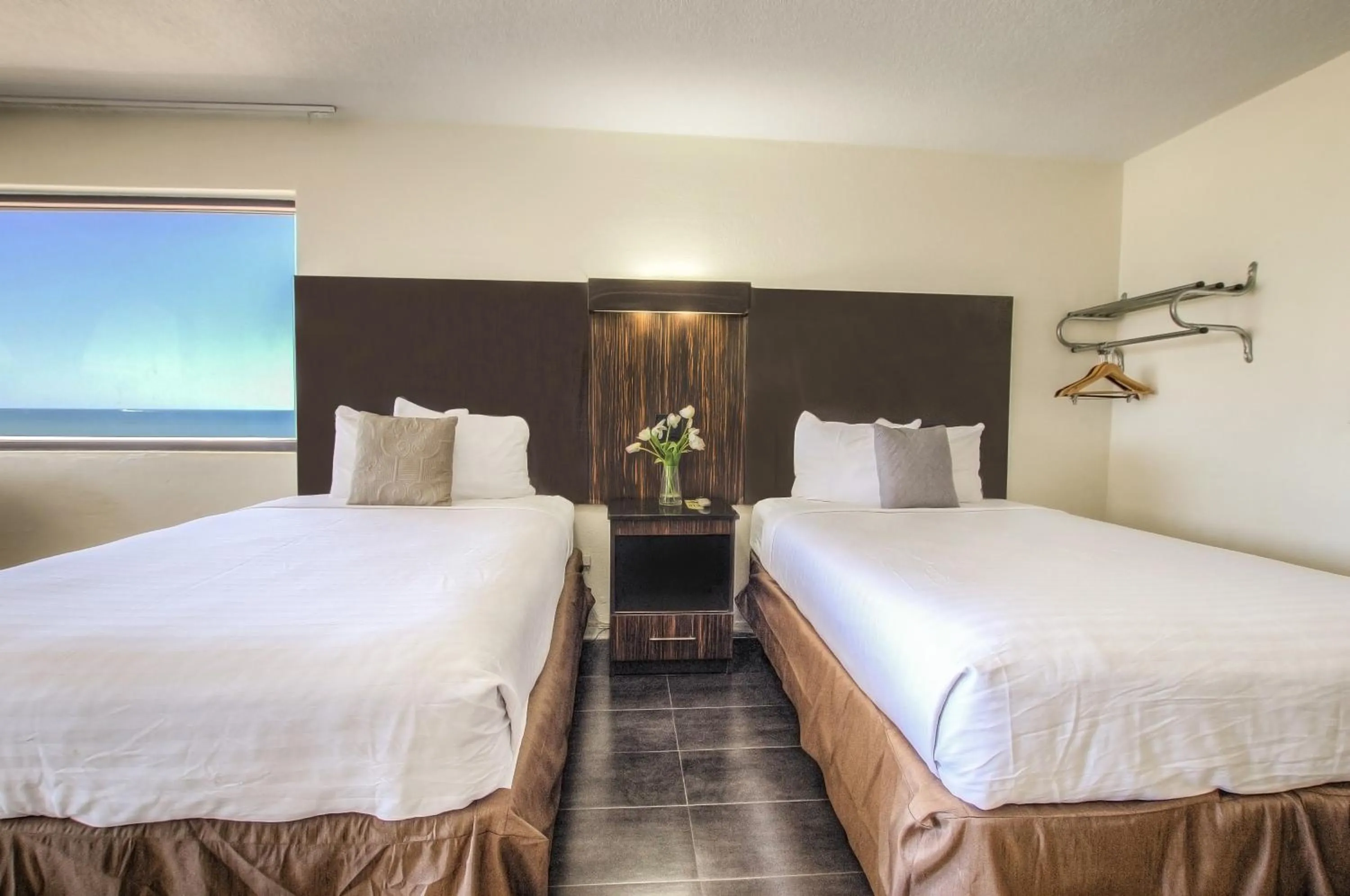 Bed in La Bella Oceanfront Inn - Daytona