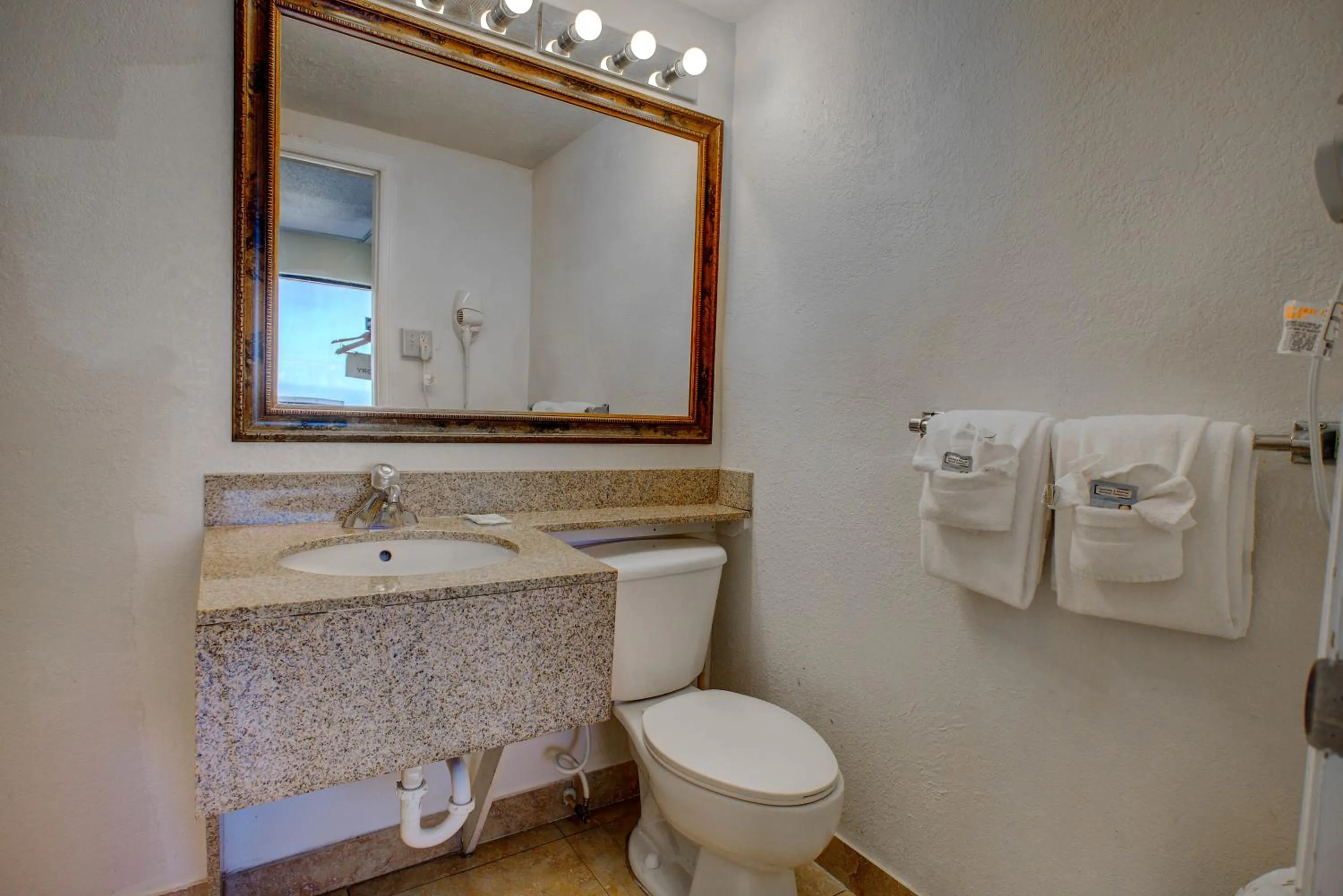 Toilet in La Bella Inn - POOL OPEN