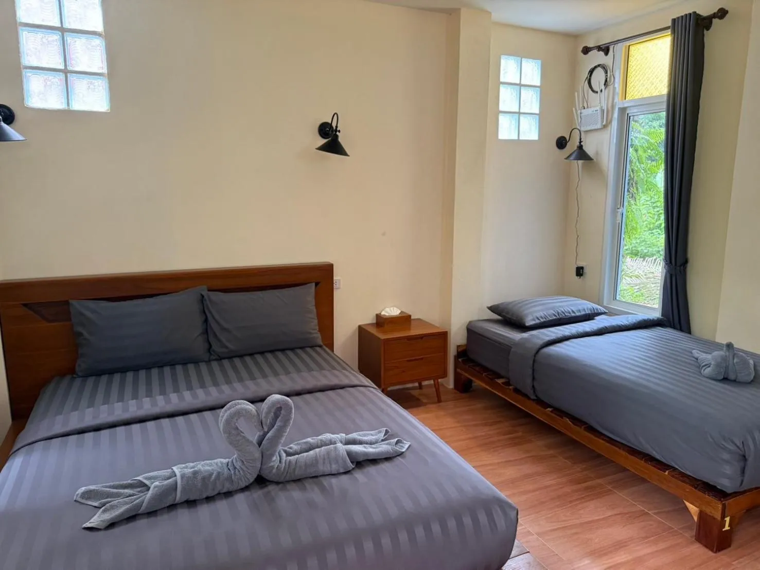 Bed in Khaosok Bamboo Huts Resort