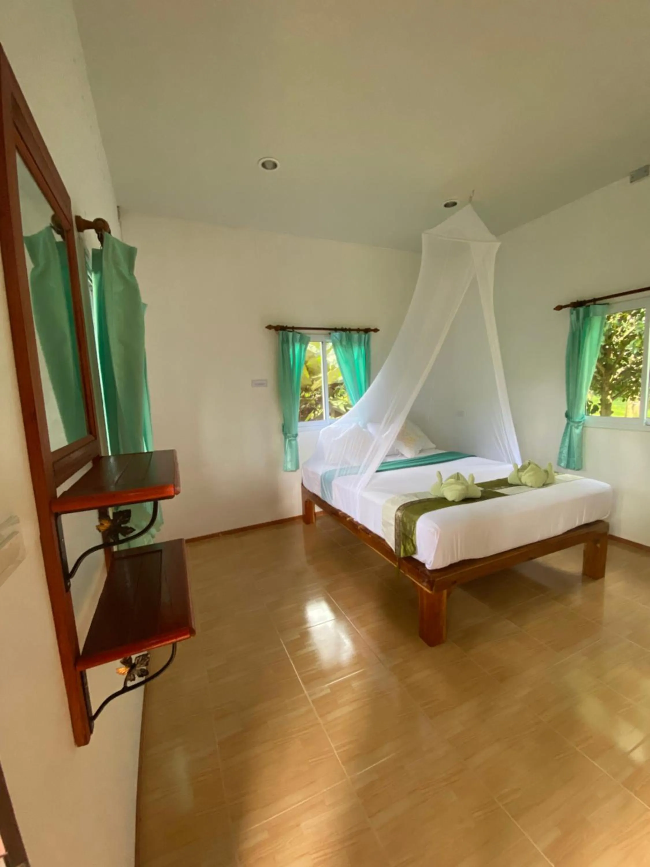 Photo of the whole room, Bed in Khaosok Bamboo Huts Resort
