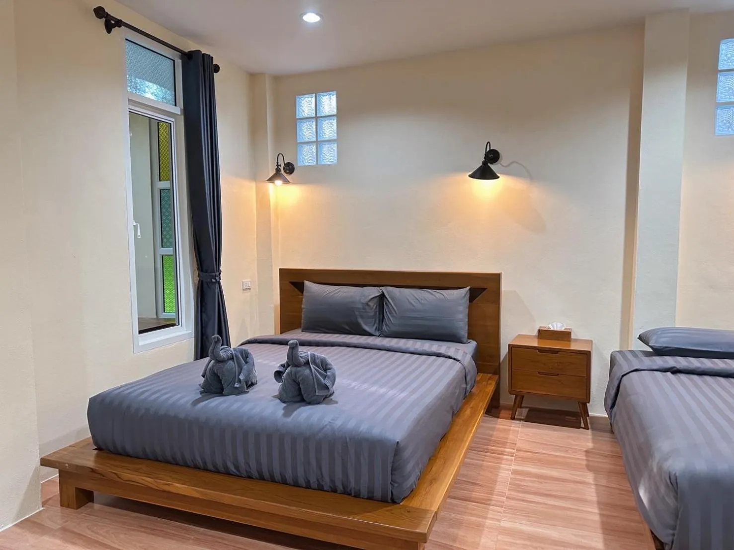 Photo of the whole room, Bed in Khaosok Bamboo Huts Resort