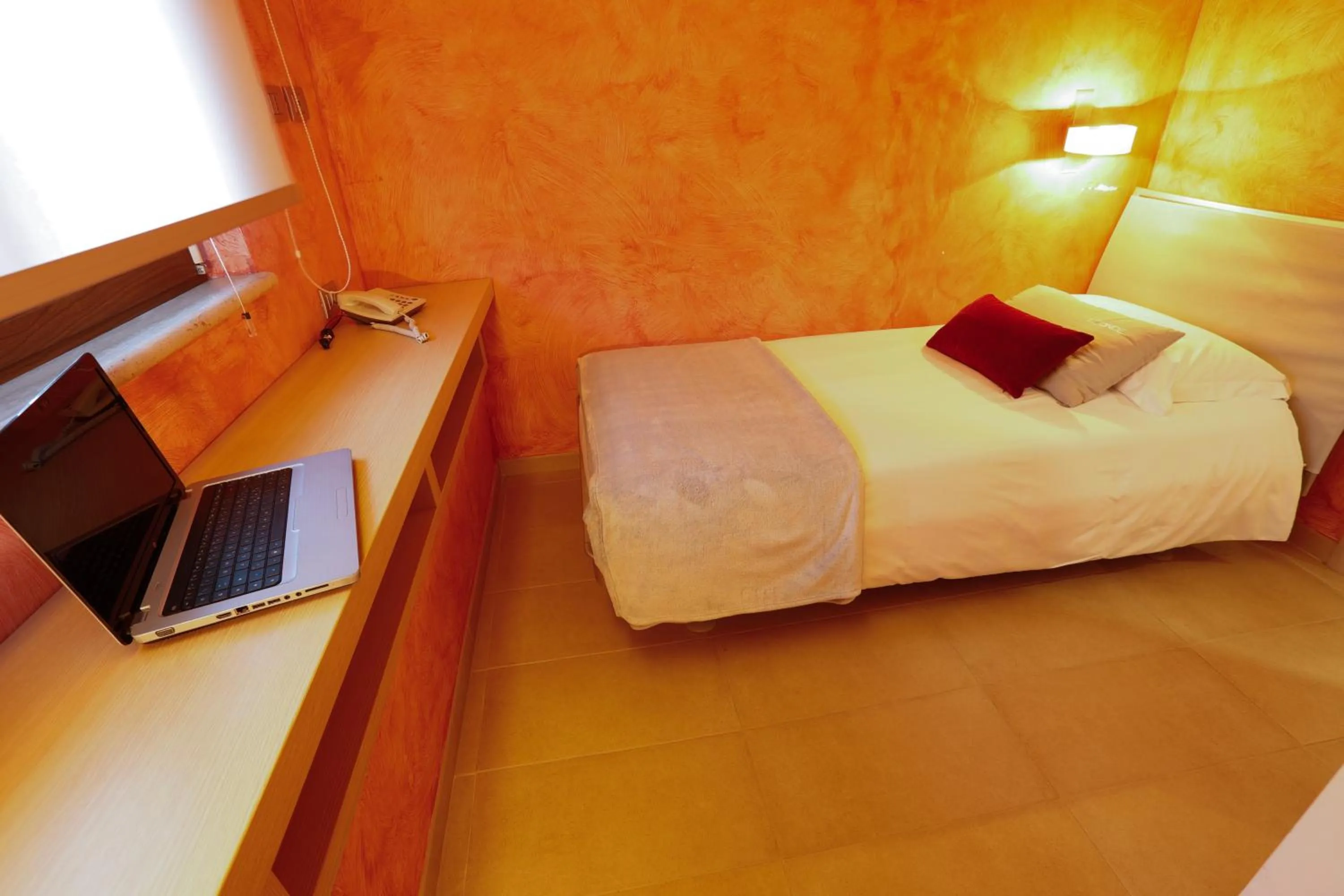 Bed in Le Onde Resort