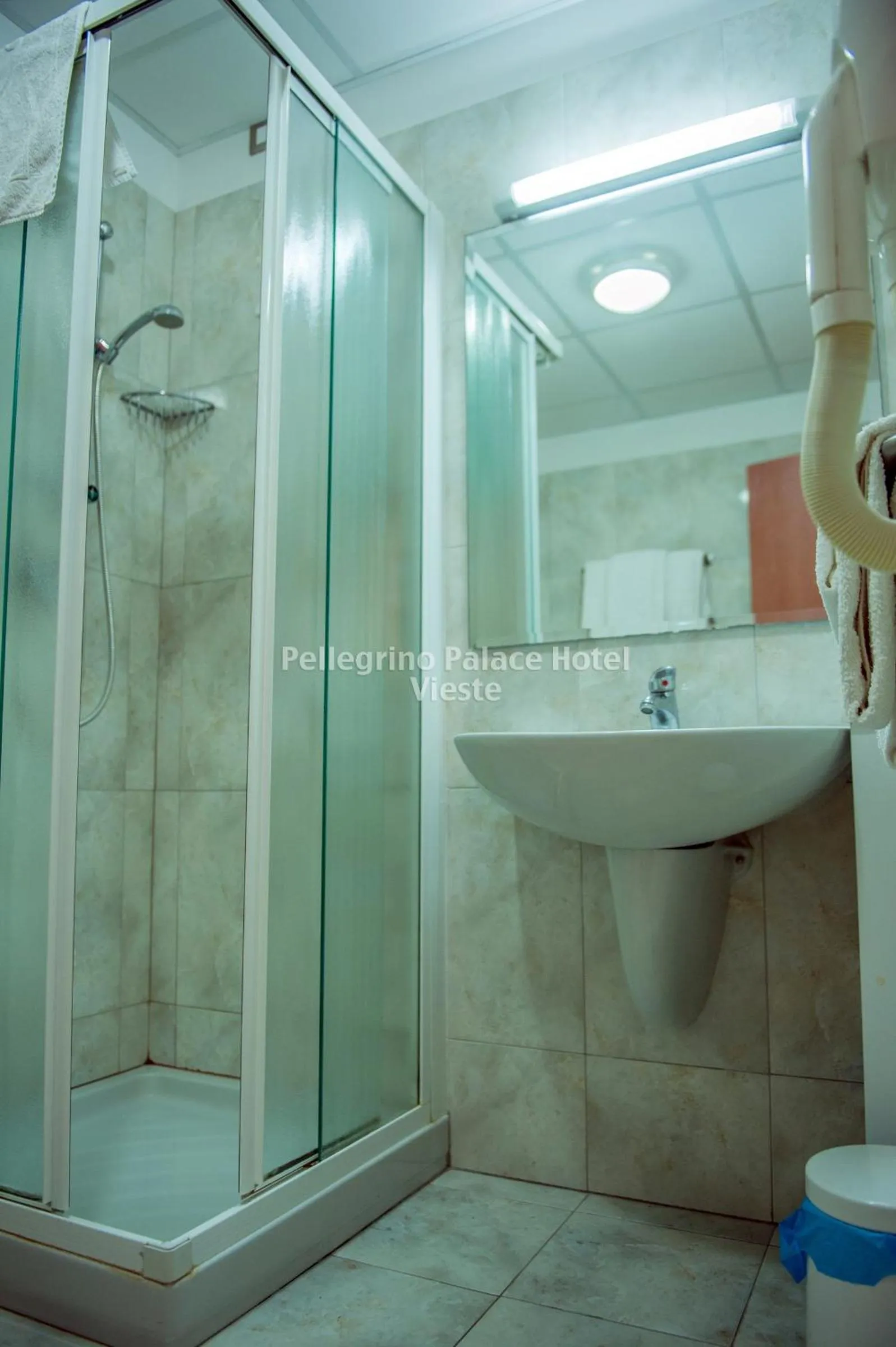 Bathroom in Pellegrino Palace Hotel