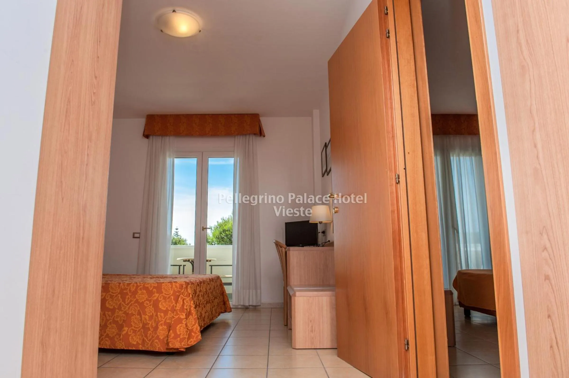 Bedroom in Pellegrino Palace Hotel