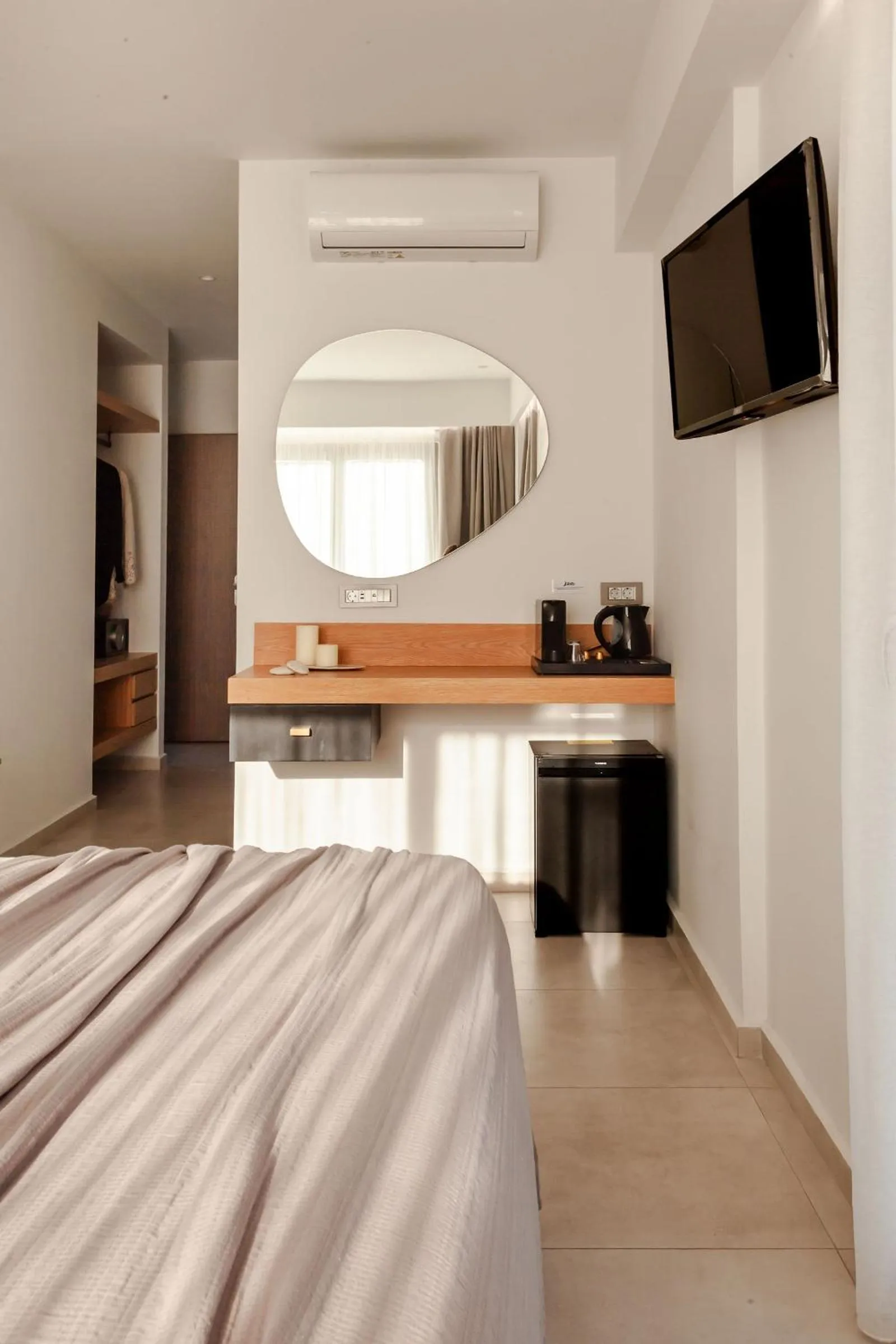 TV and multimedia, Bed in Batis Aero Beachfront Wellbeing Hotel