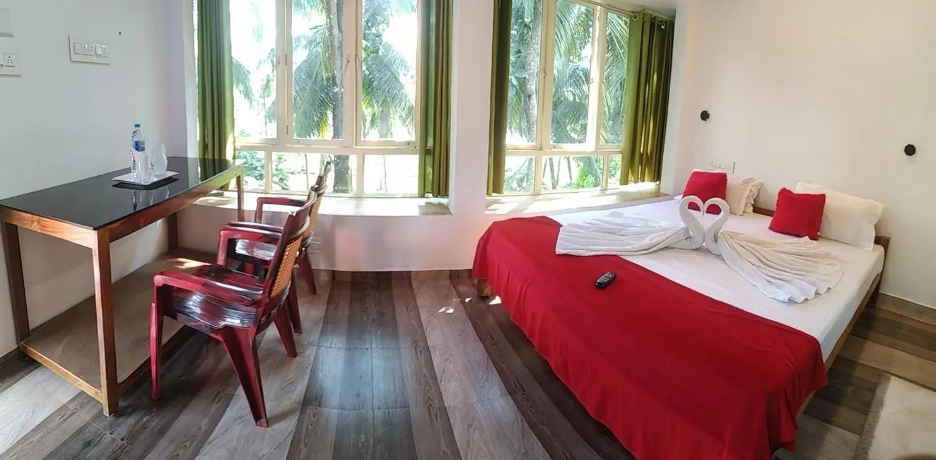 RoomNo.107 Deluxe AC Room with Balcony and Lake view in Blue Birds Homestay RoomNo.107 Deluxe AC Room with Balcony and Lake view in Blue Birds Homestay