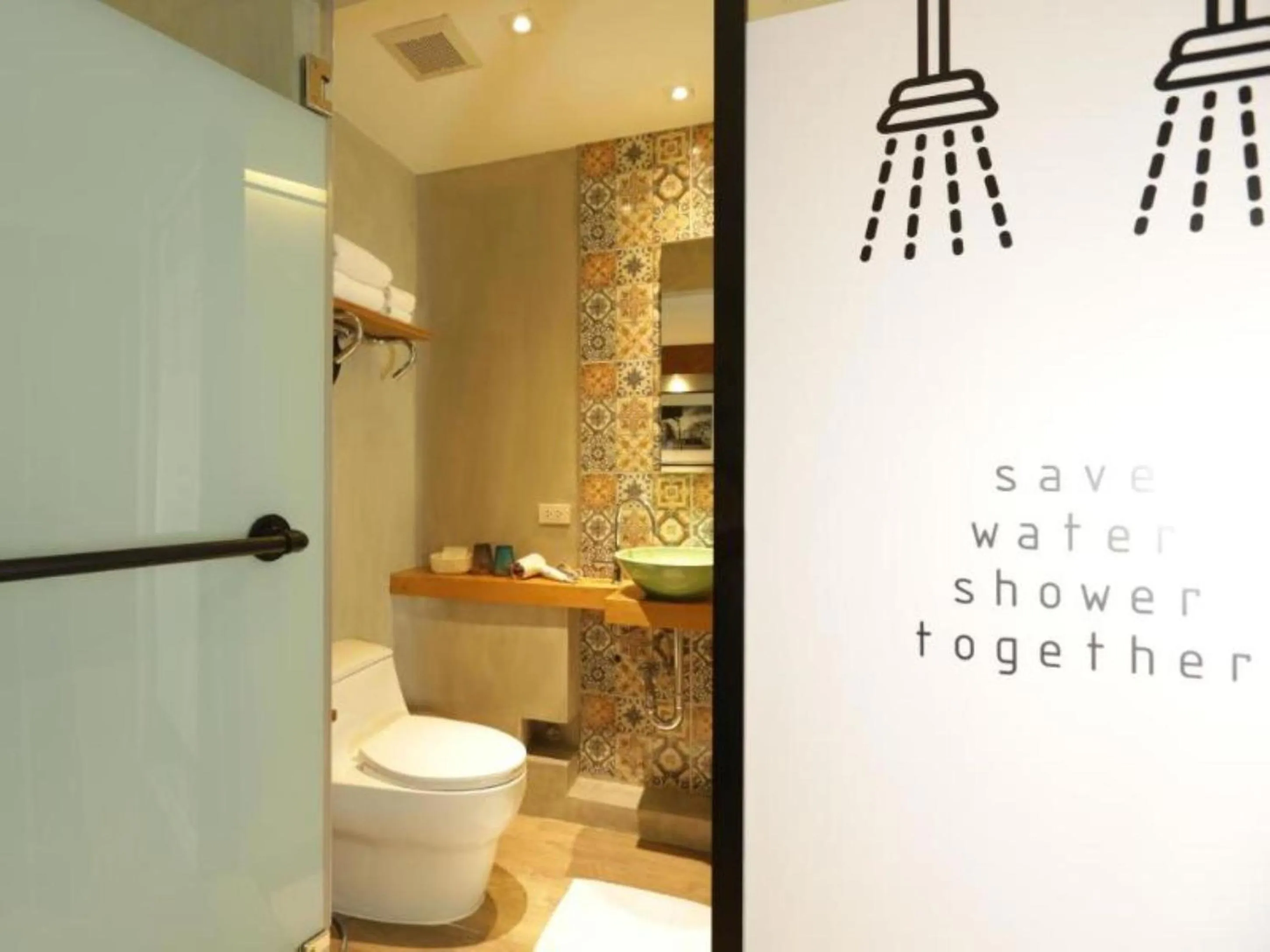 Bathroom in Nandha Hotel