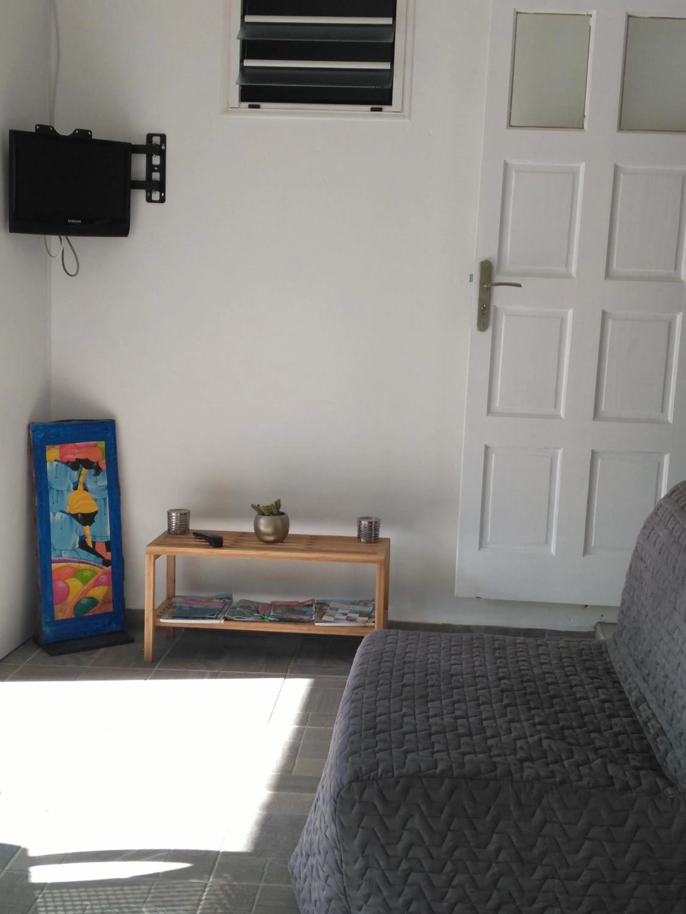 Communal lounge/ TV room in Ti Coco