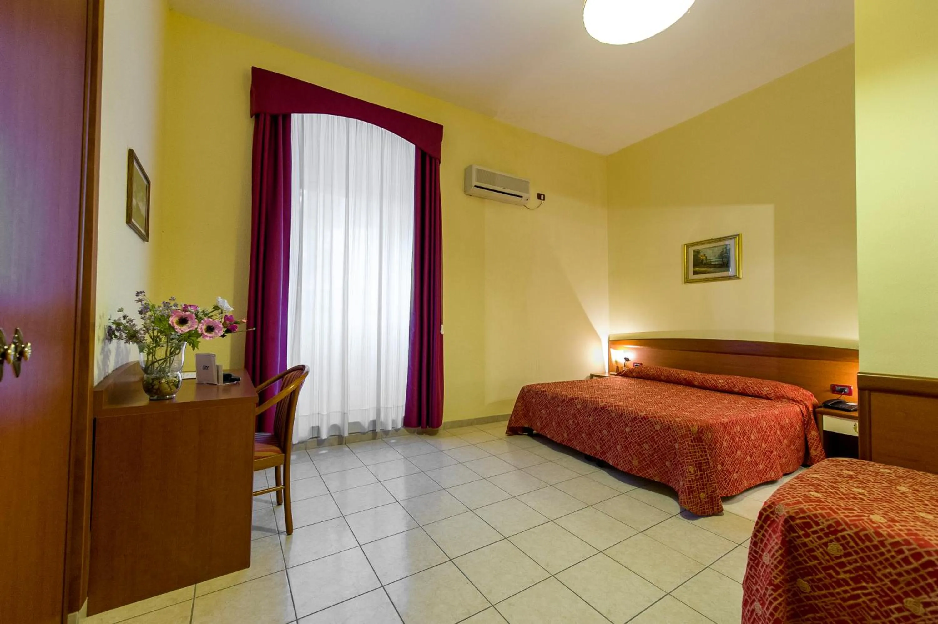 Bed in Hotel Miramare