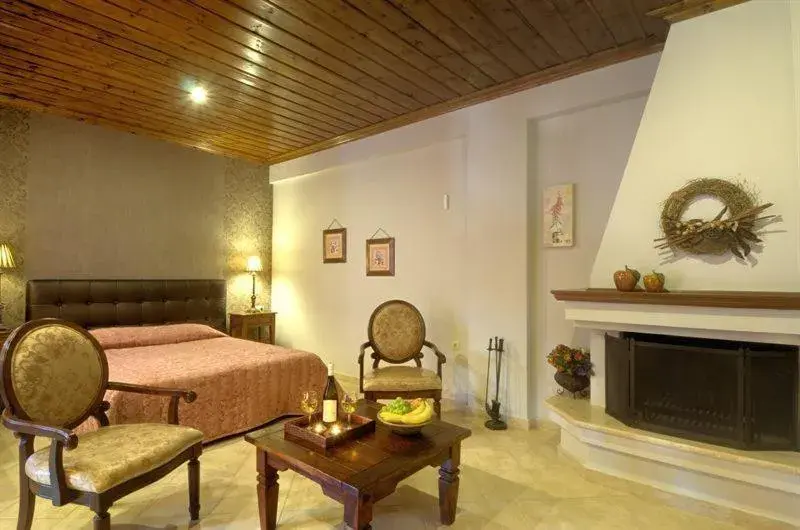 Junior Suite with Fireplace in Iatrou Guesthouse Junior Suite with Fireplace in Iatrou Guesthouse
