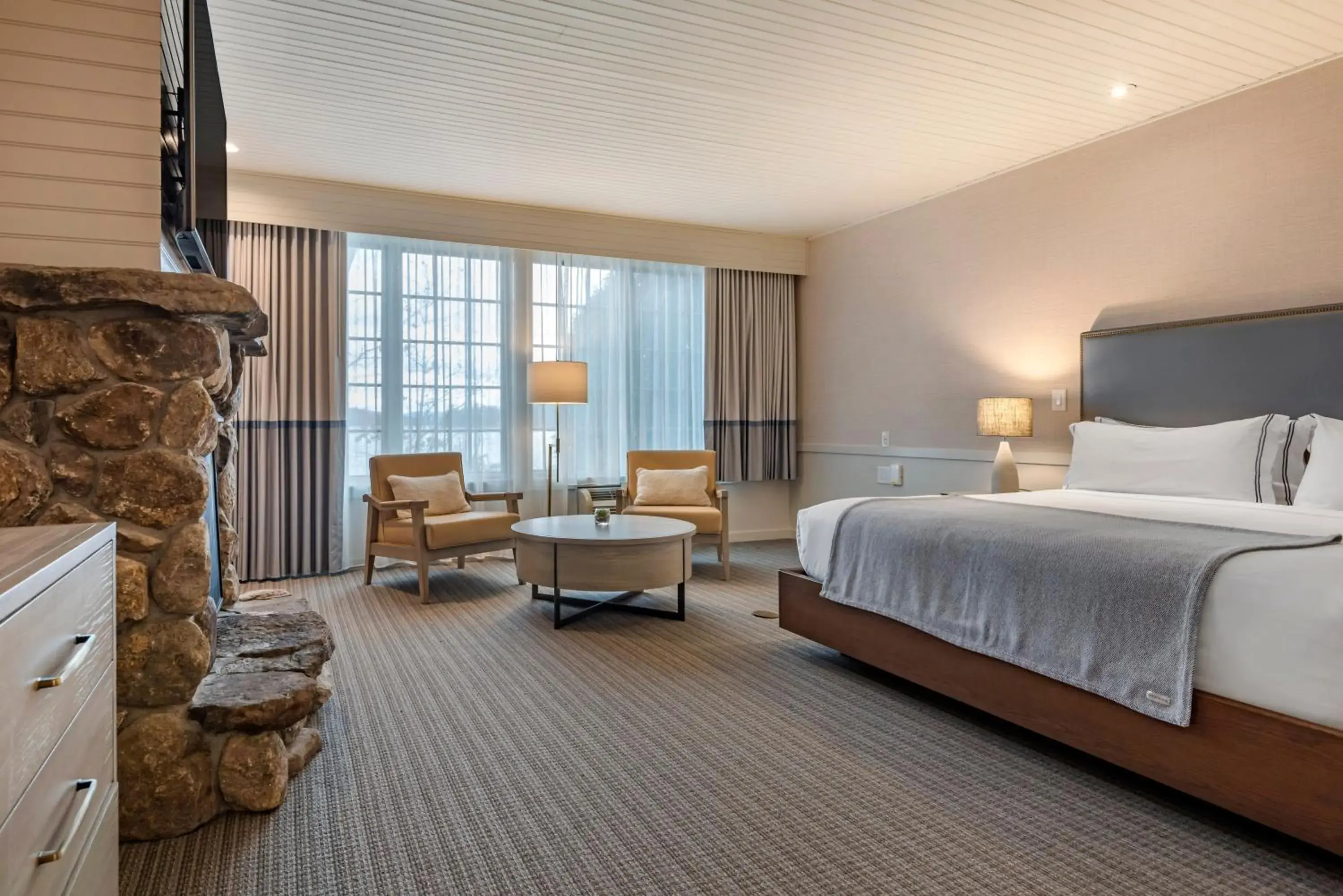 Boathouse Lodge Luxurious King balcony in Mill Falls Resort Collection at the Lake Boathouse Lodge Luxurious King balcony in Mill Falls Resort Collection at the Lake