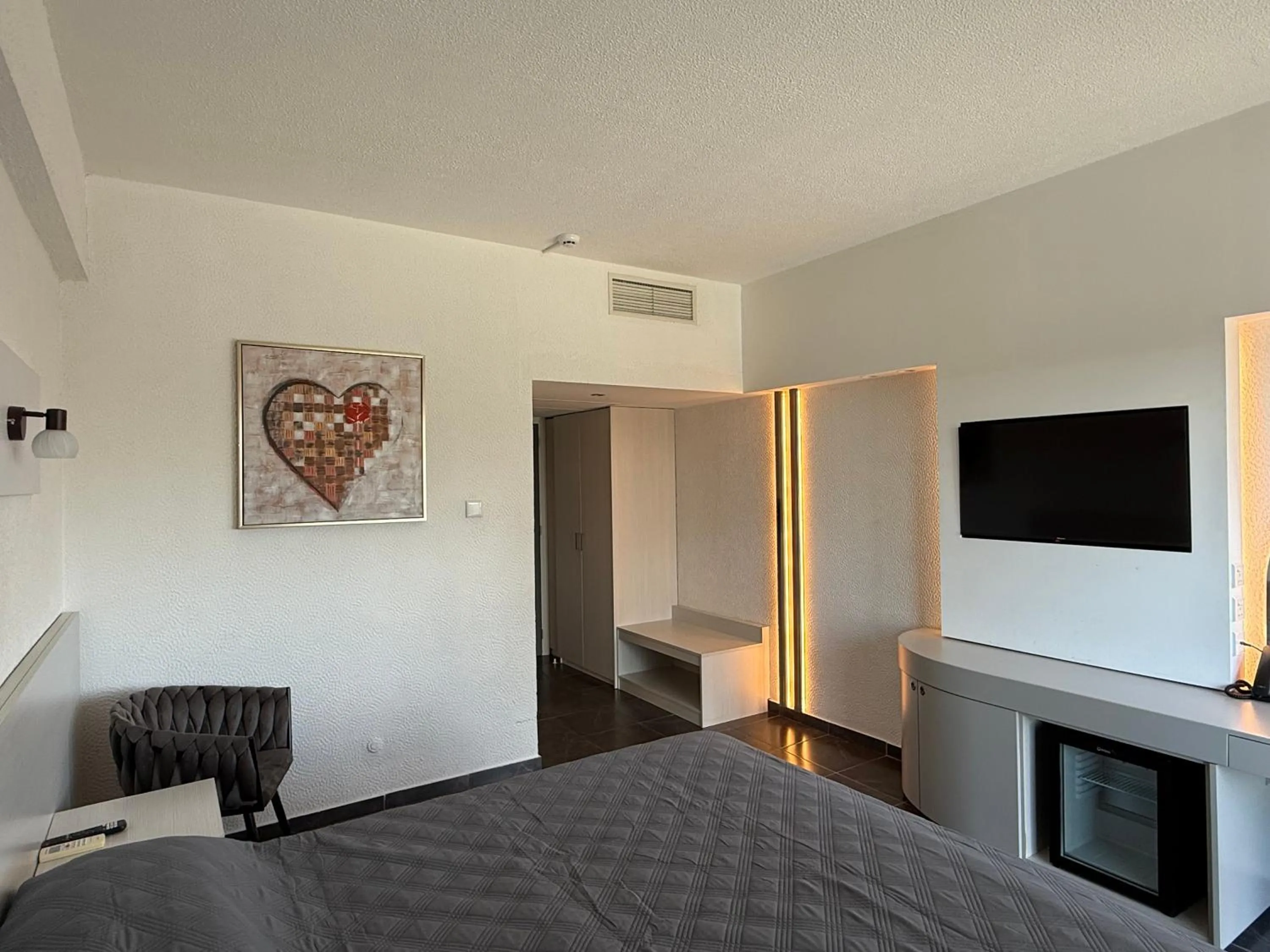 Bed in Sveltos Hotel