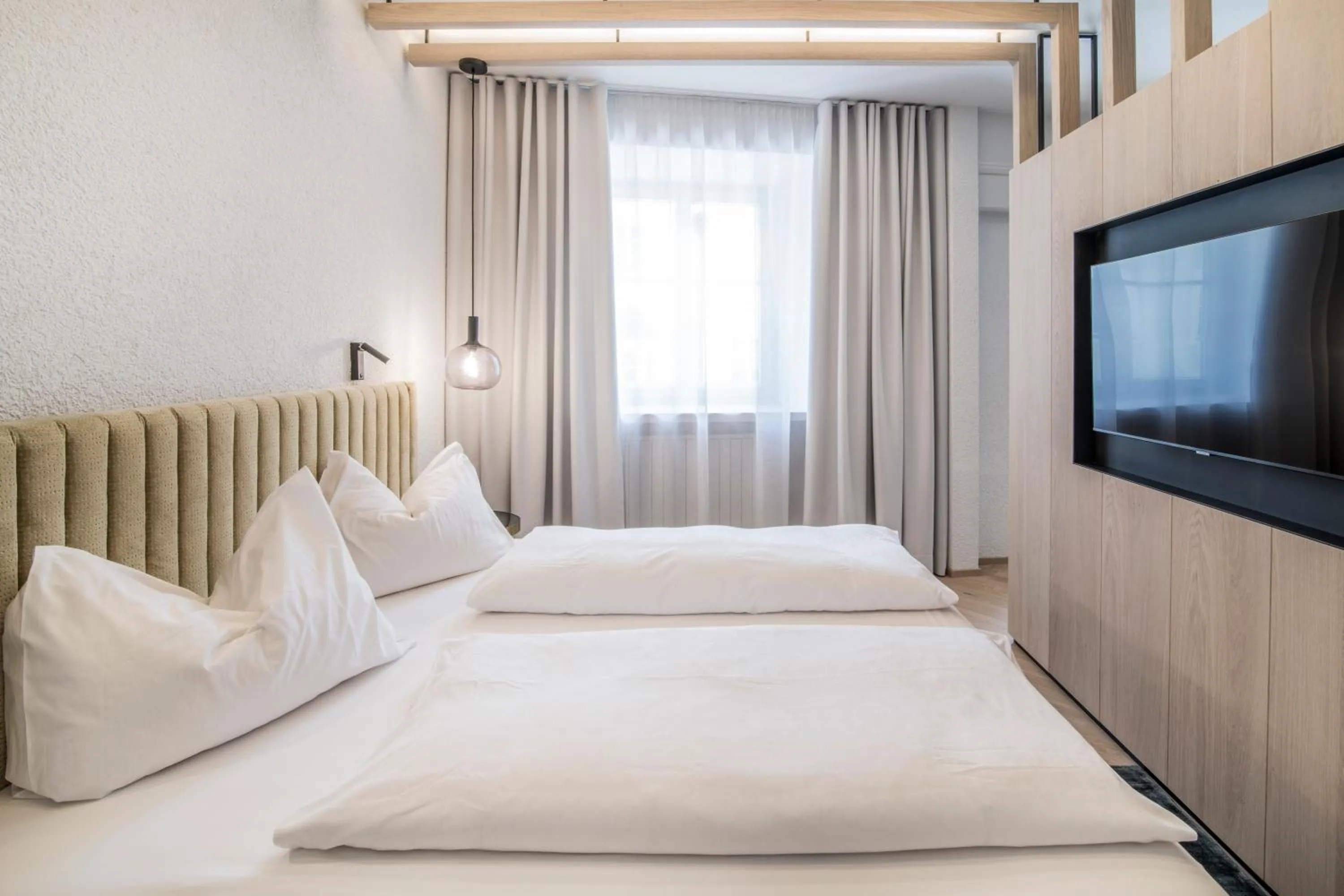 Bed in Posthotel Lamm