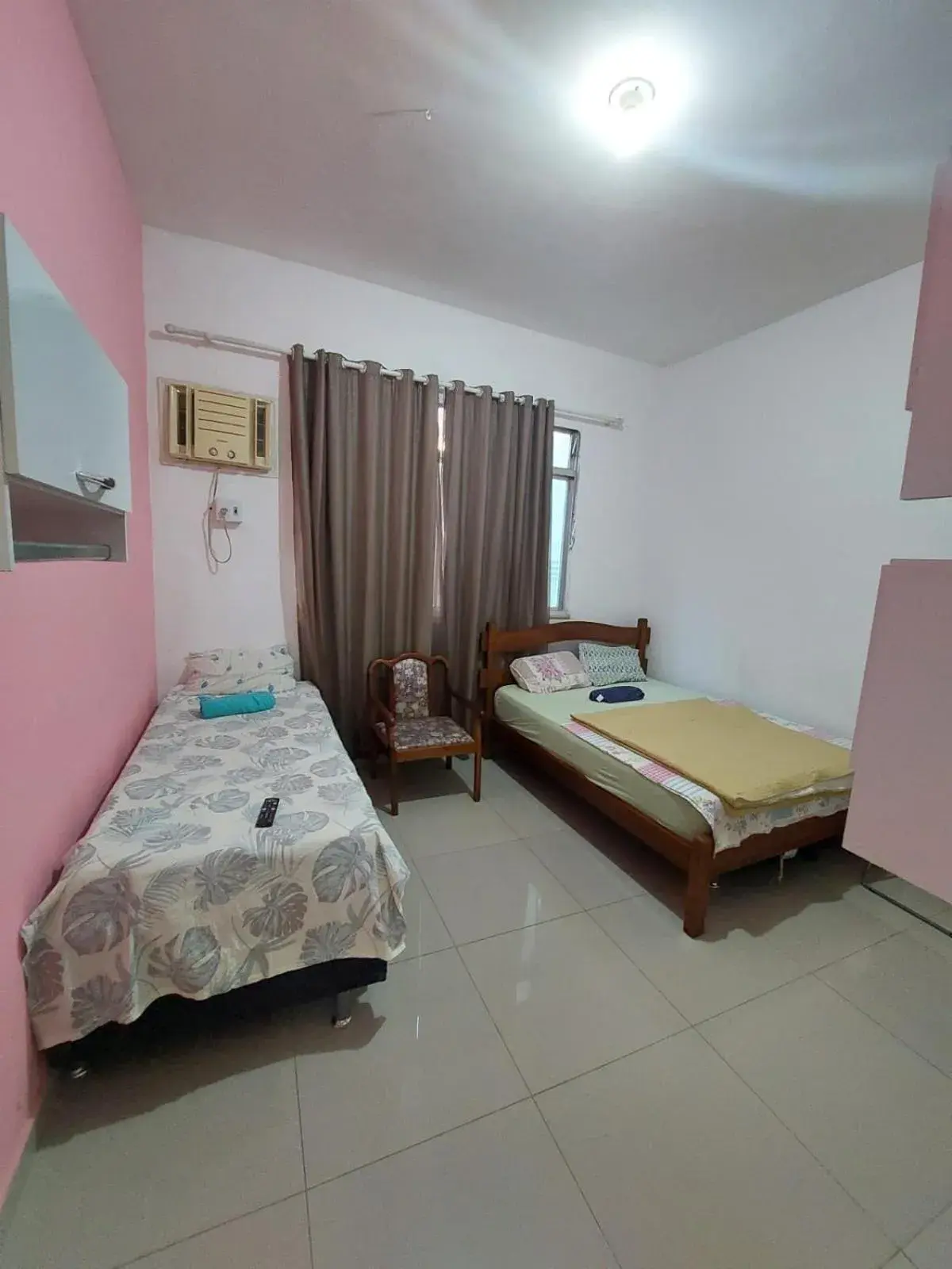 Quadruple Room with Private Bathroom - single occupancy in Pousada Cantinho da Família Quadruple Room with Private Bathroom - single occupancy in Pousada Cantinho da Família
