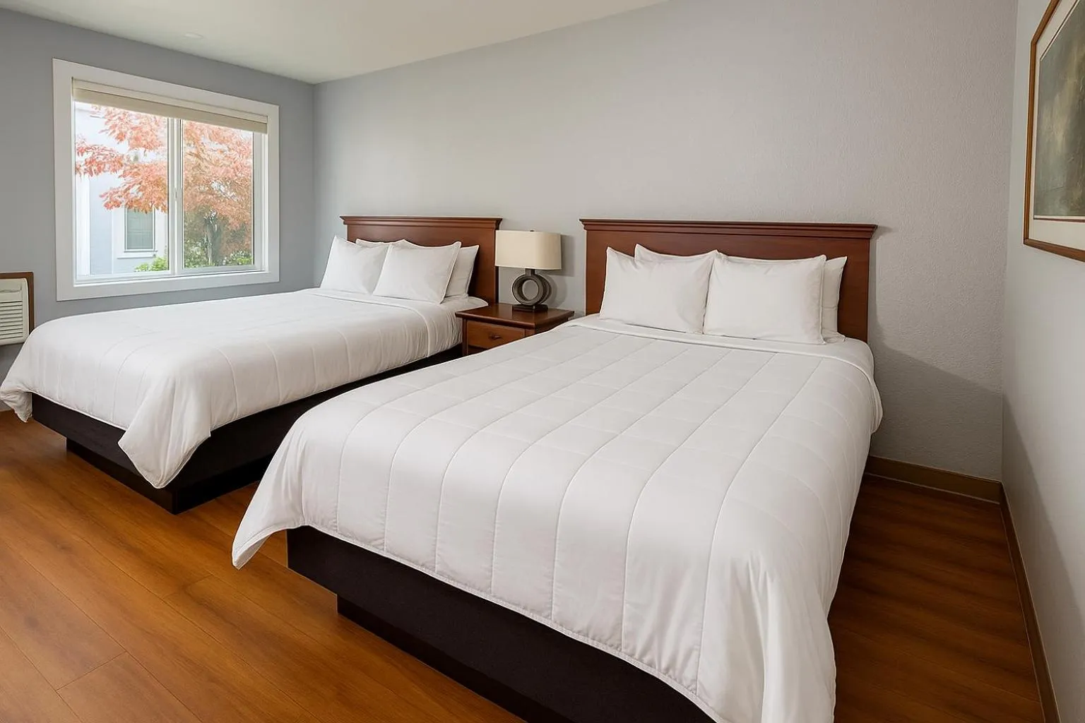 Bed in Sunnyside Inn and Suites