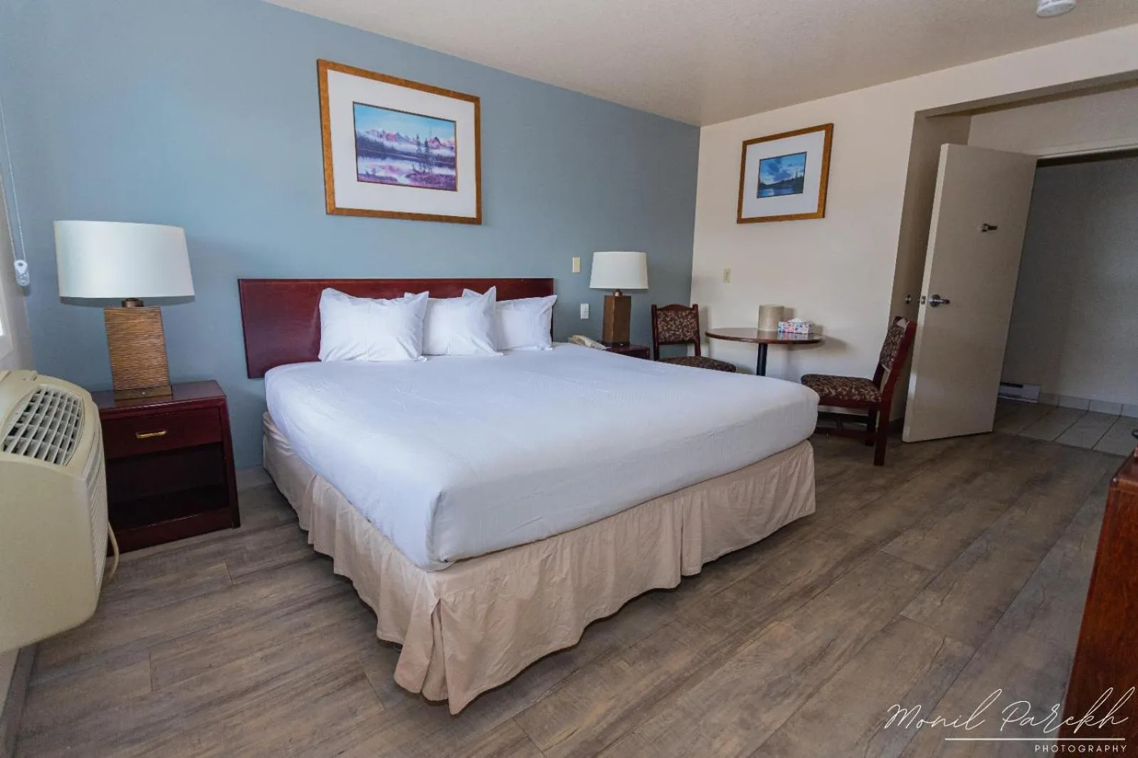 Bed in Empire Inn & Suites