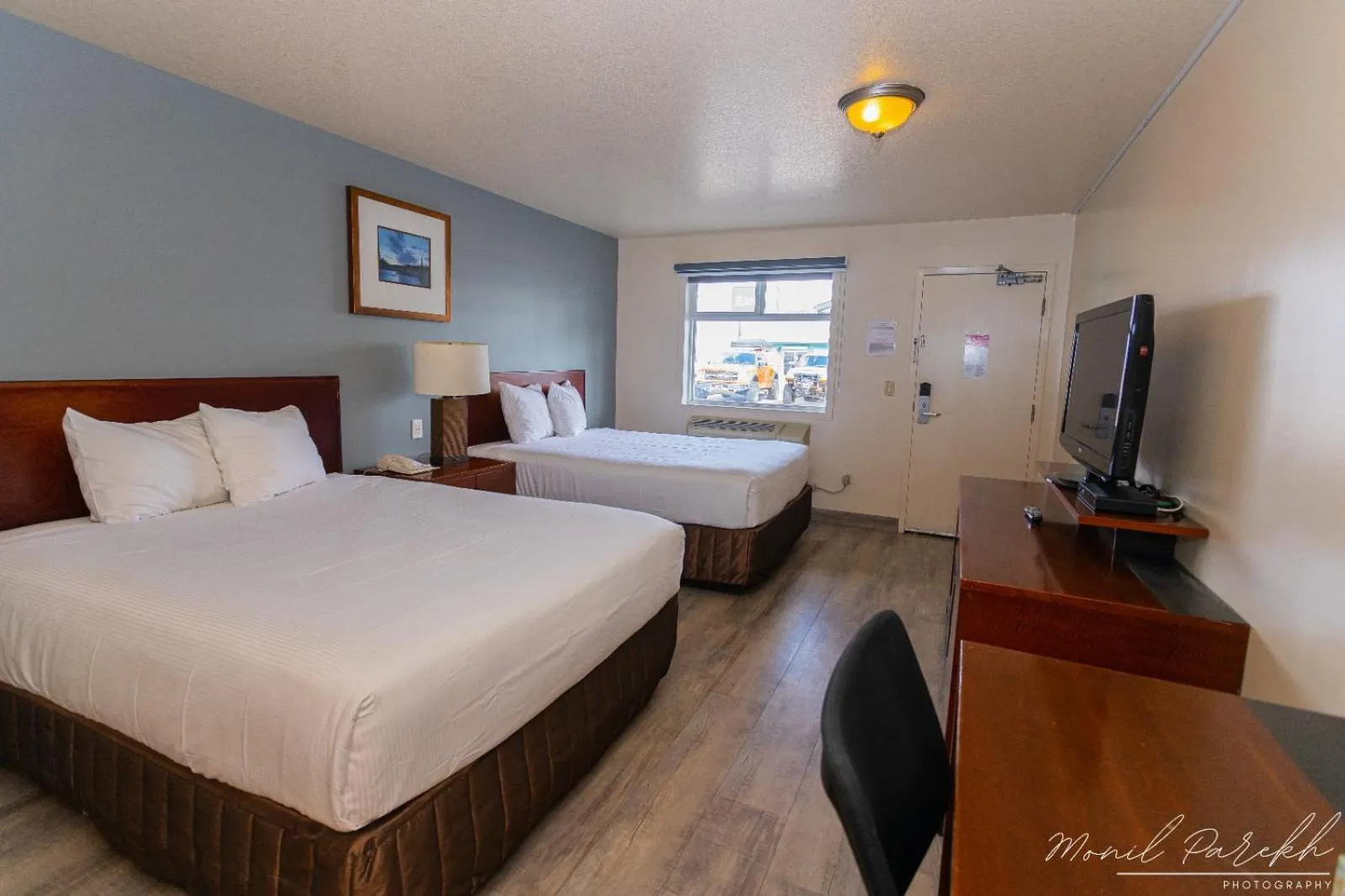 Bed in Empire Inn & Suites