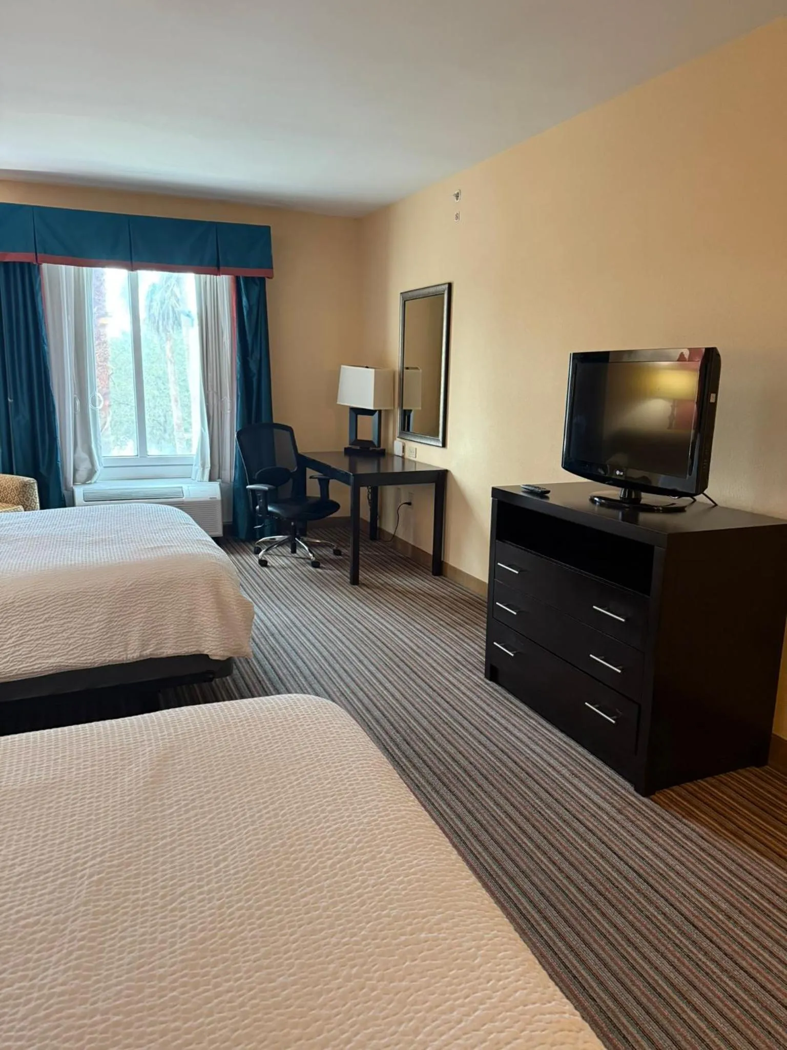Photo of the whole room, Bed in Holiday Inn Titusville/Kennedy Space Center by IHG