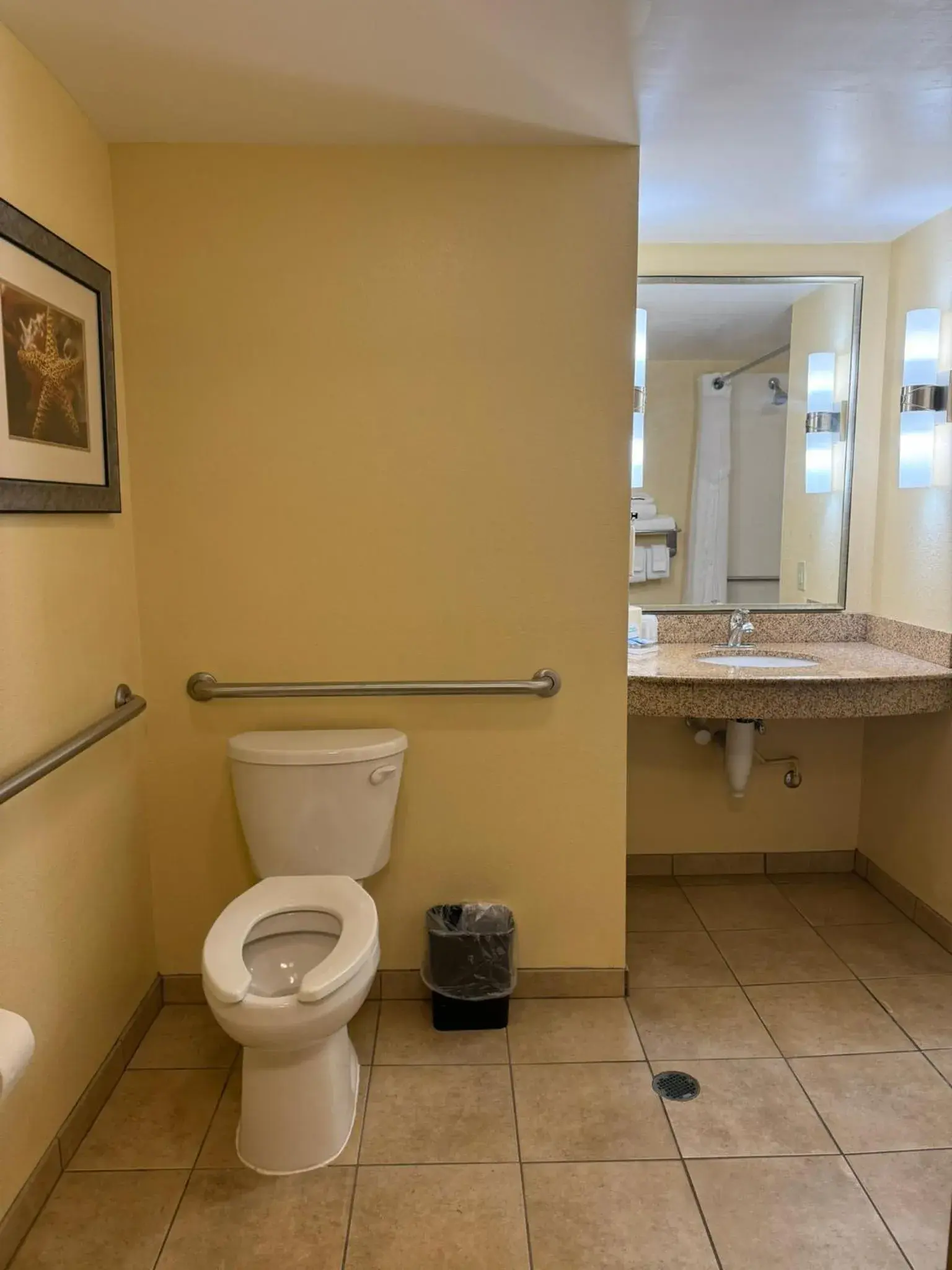 Standard Queen Room with Two Queen Beds and Mobility Accessible Roll-In Shower in Holiday Inn Titusville/Kennedy Space Center by IHG Standard Queen Room with Two Queen Beds and Mobility Accessible Roll-In Shower in Holiday Inn Titusville/Kennedy Space Center by IHG