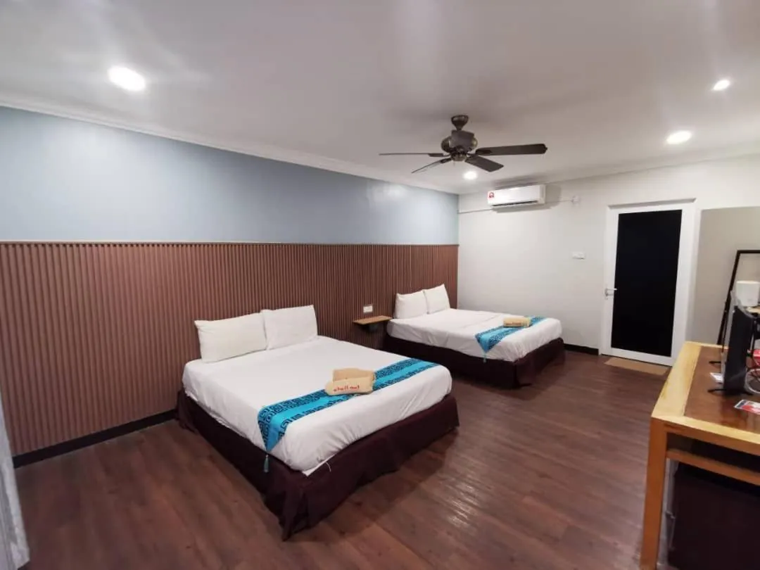 Bed in Adina Drive In Motel