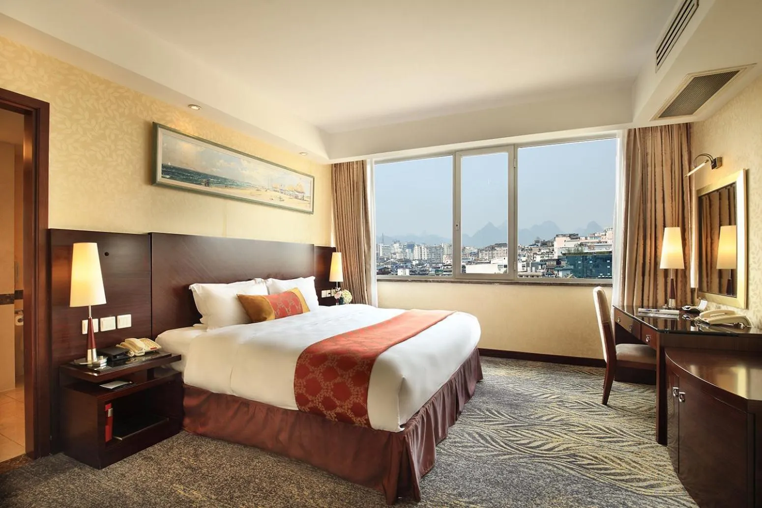 Photo of the whole room, Bed in Lijiang Waterfall Hotel Guilin