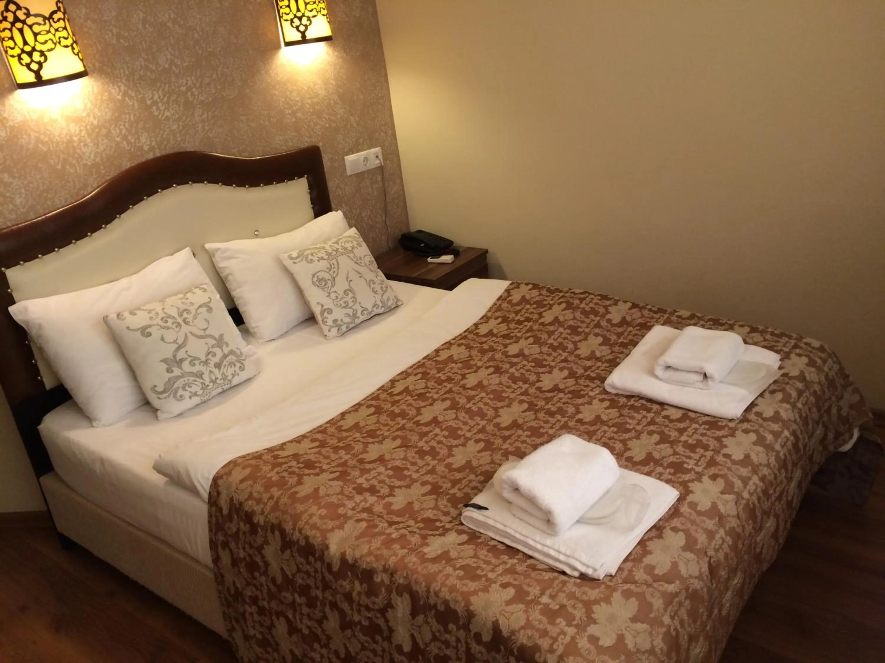 Photo of the whole room, Bed in Hotel Buhara Family Inn