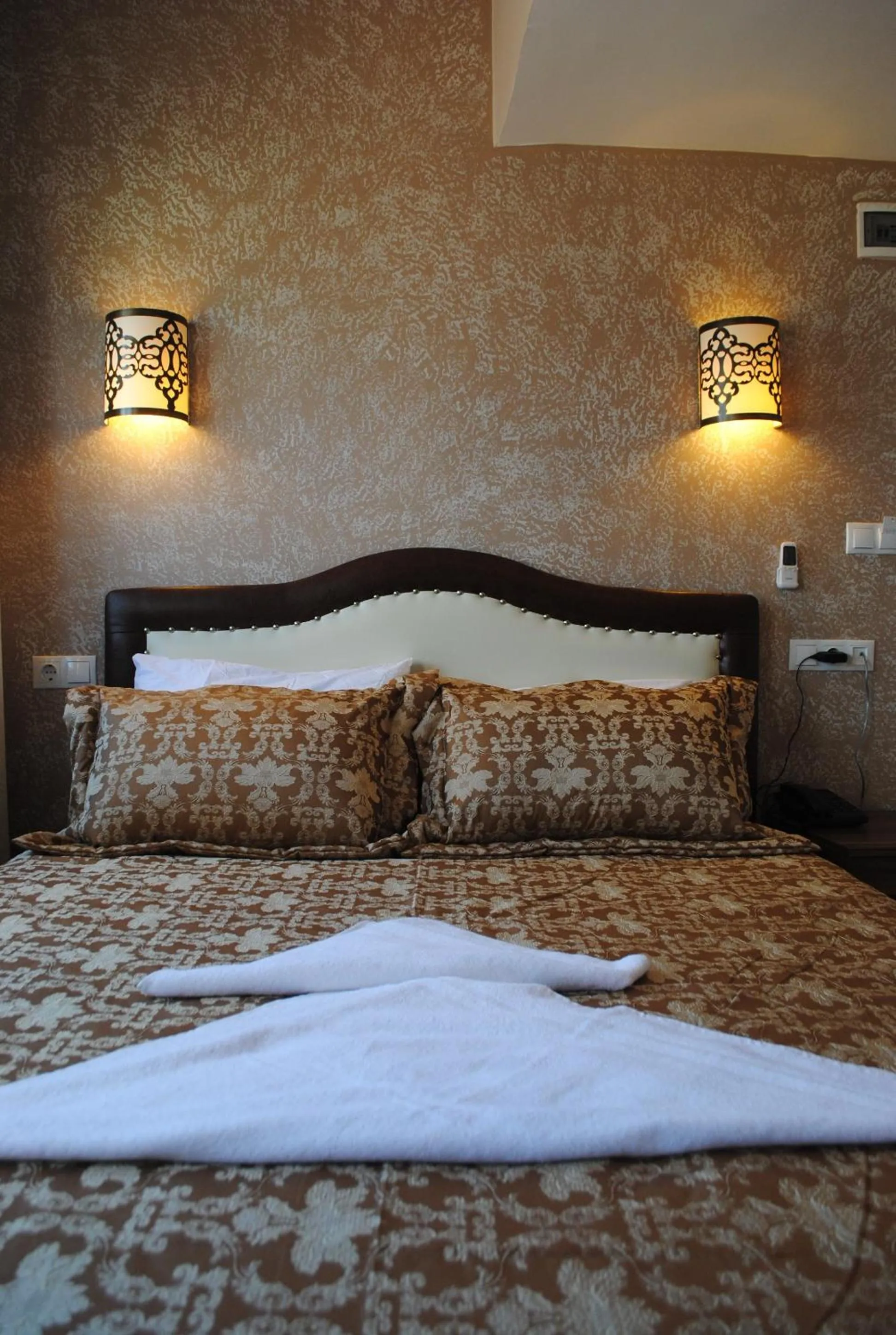 Bed in Hotel Buhara Family Inn