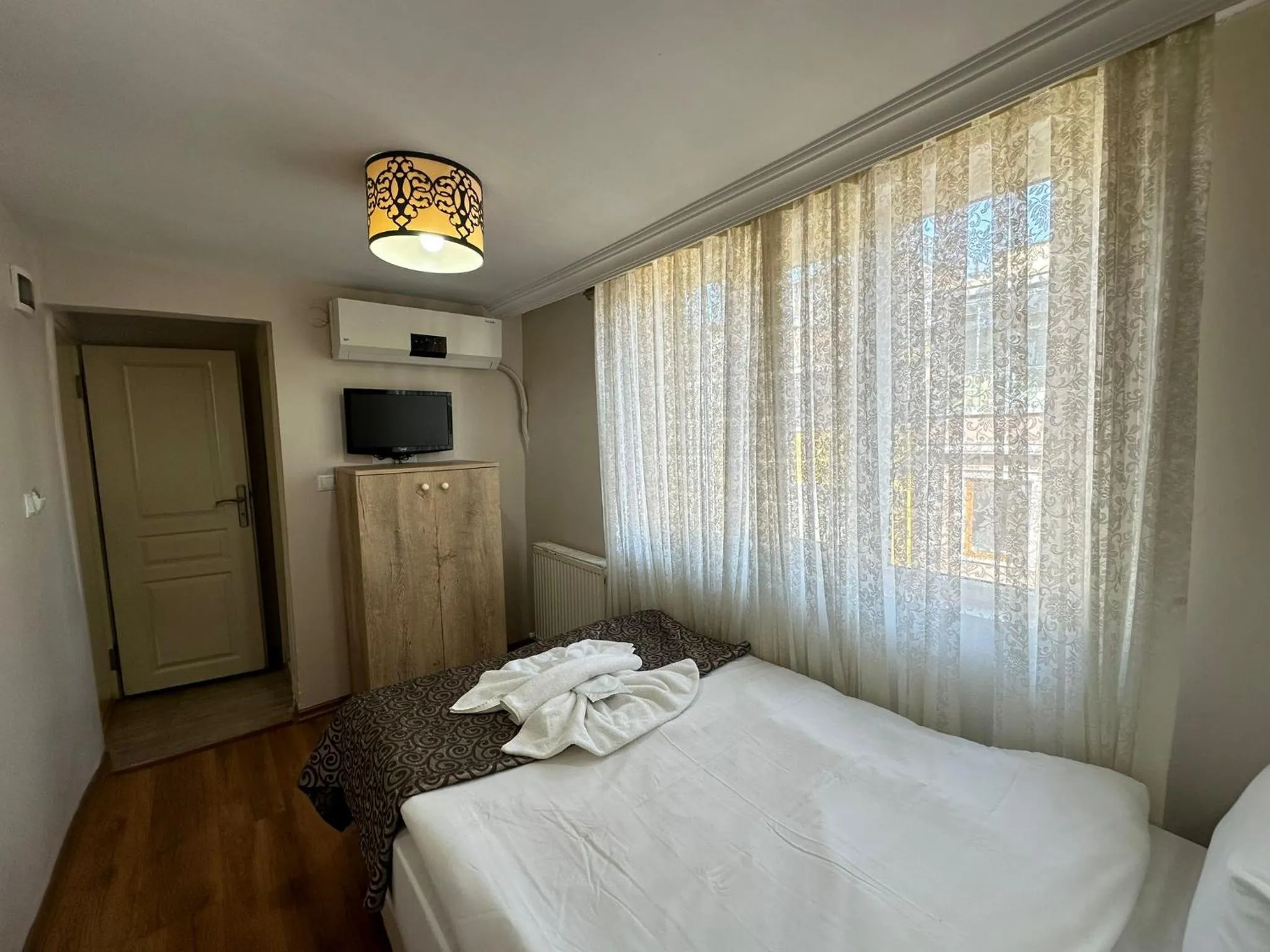 TV and multimedia, Bed in Hotel Buhara Family Inn