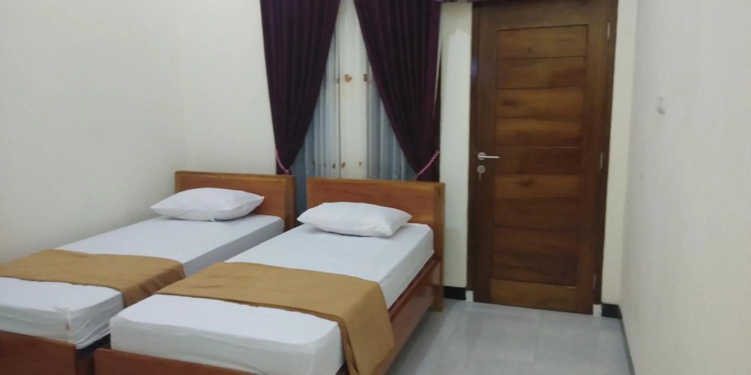 Bed in Arrys Watukarung Surfcamp