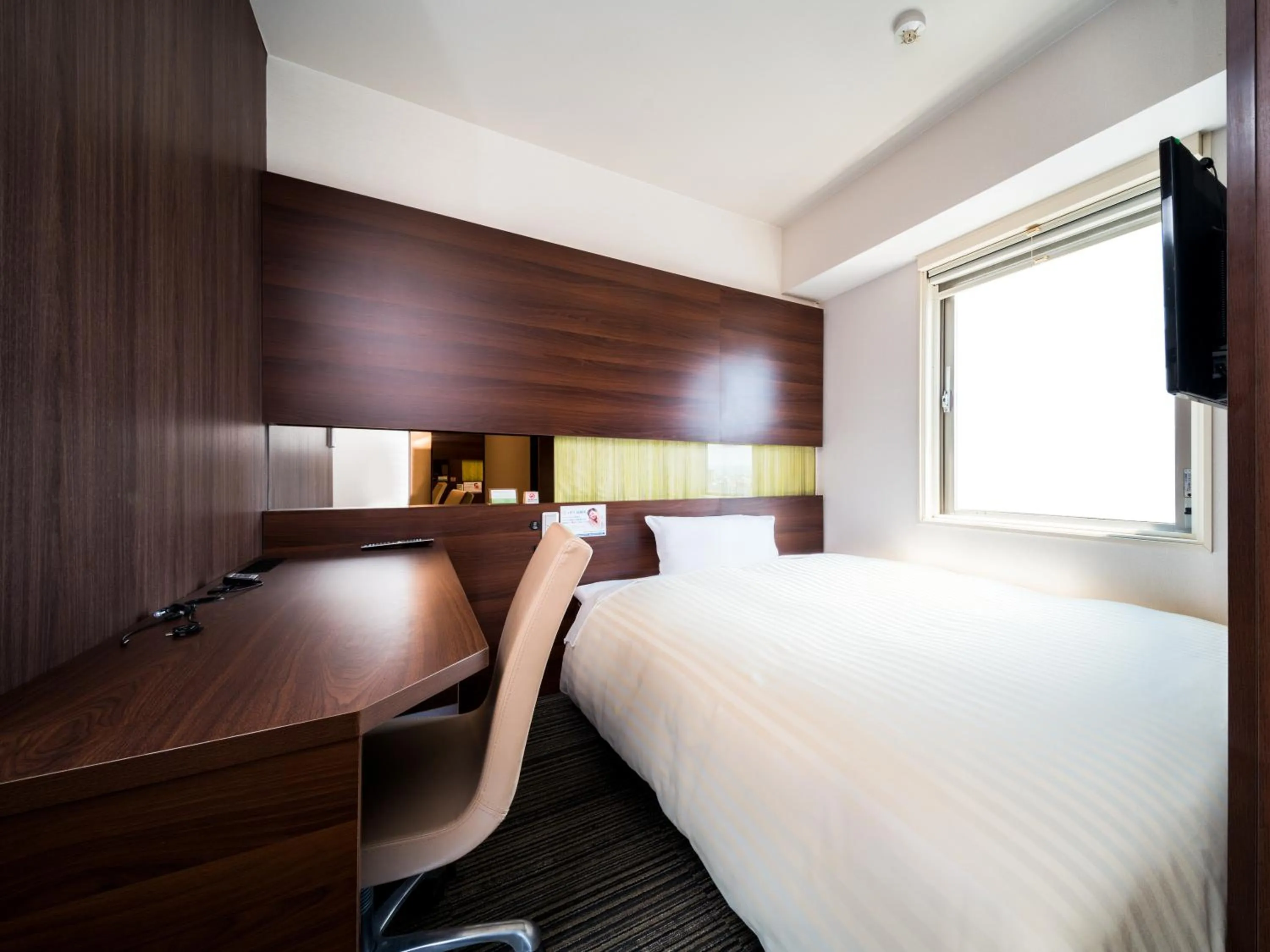 Bed in Super Hotel Izumo Ekimae