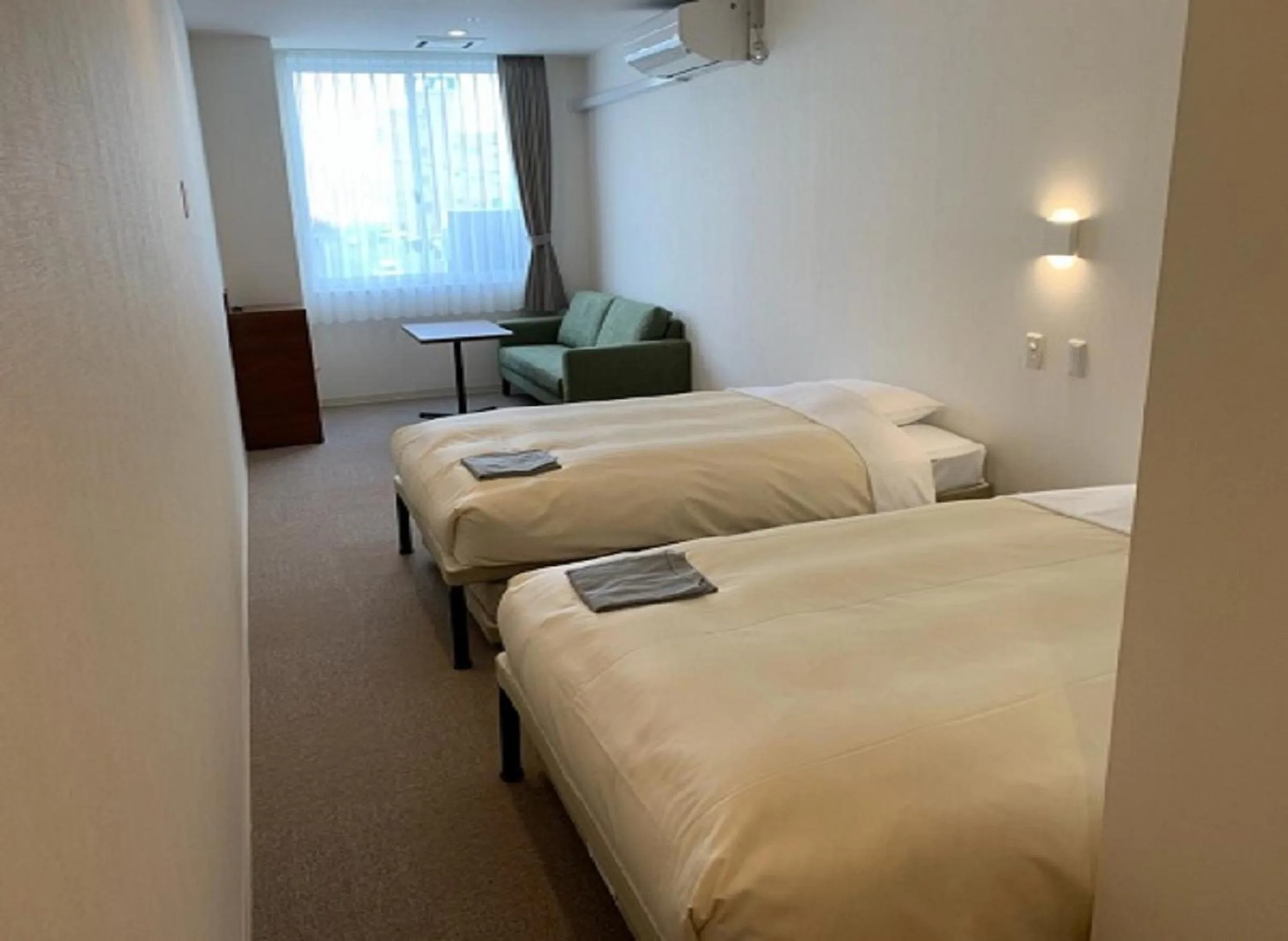 Photo of the whole room, Bed in Hotel Crown Hills Kushiro