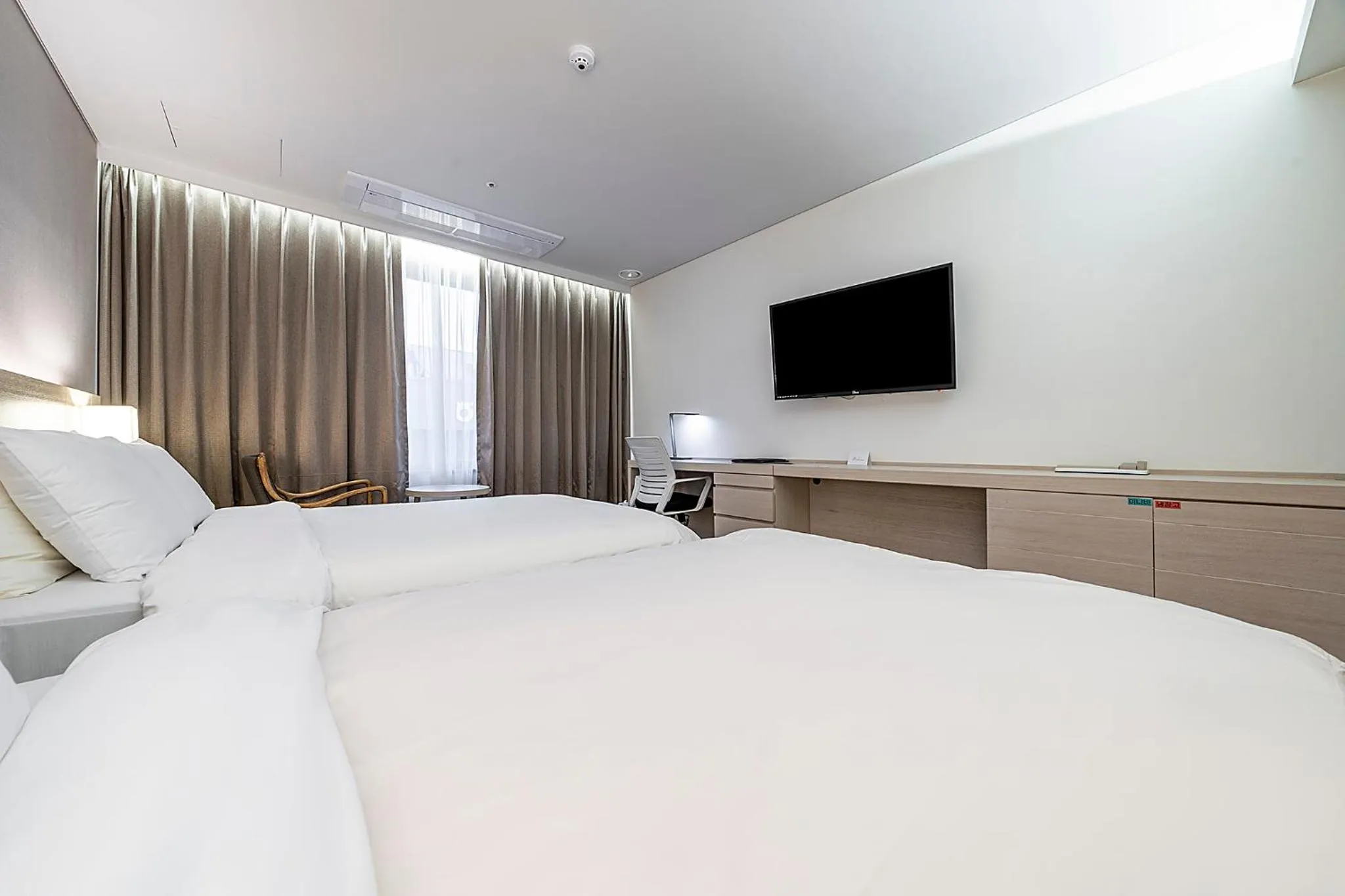 Bed in Wonju Citi Hotel